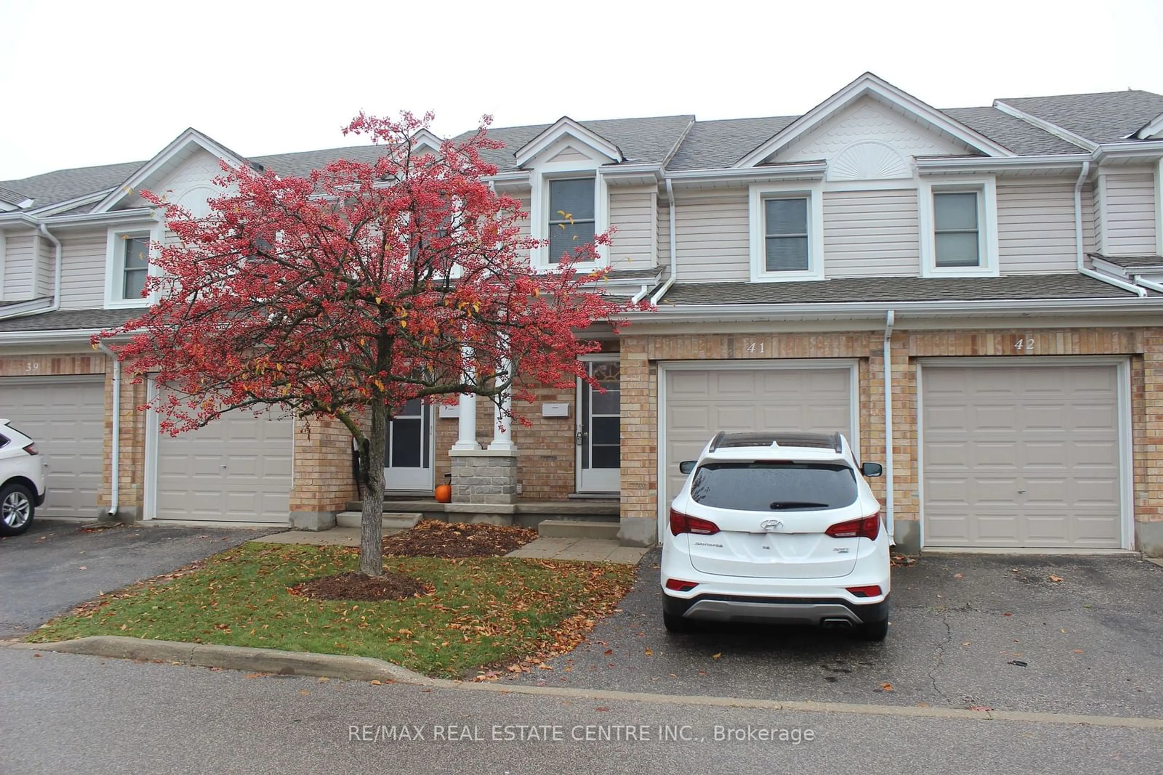 A pic from outside/outdoor area/front of a property/back of a property/a pic from drone, street for 66 RODGERS Rd #41, Guelph Ontario N1G 4Y5