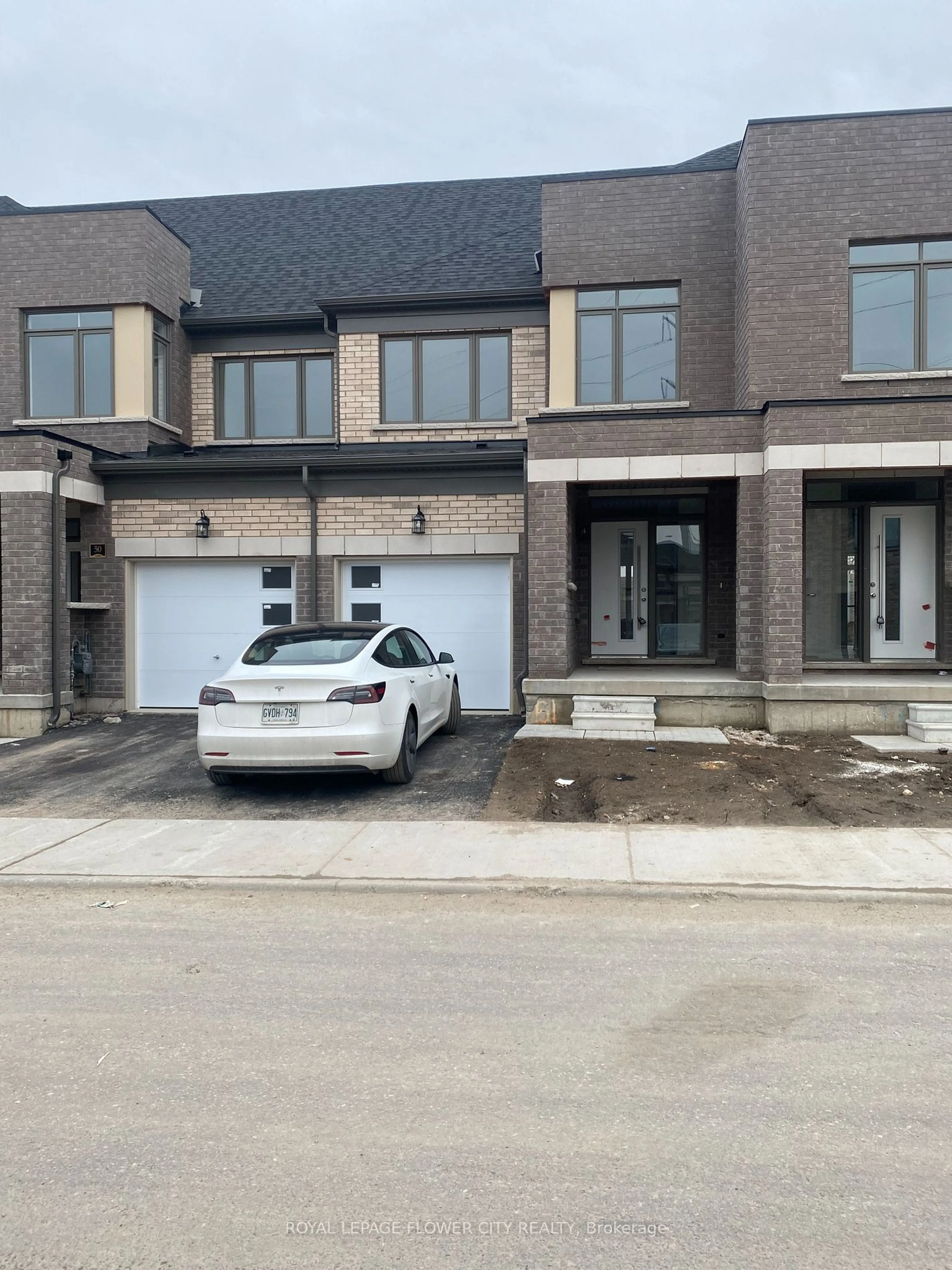 Home with brick exterior material, street for 166 Deerpath Dr #51, Guelph Ontario N1K 0E2