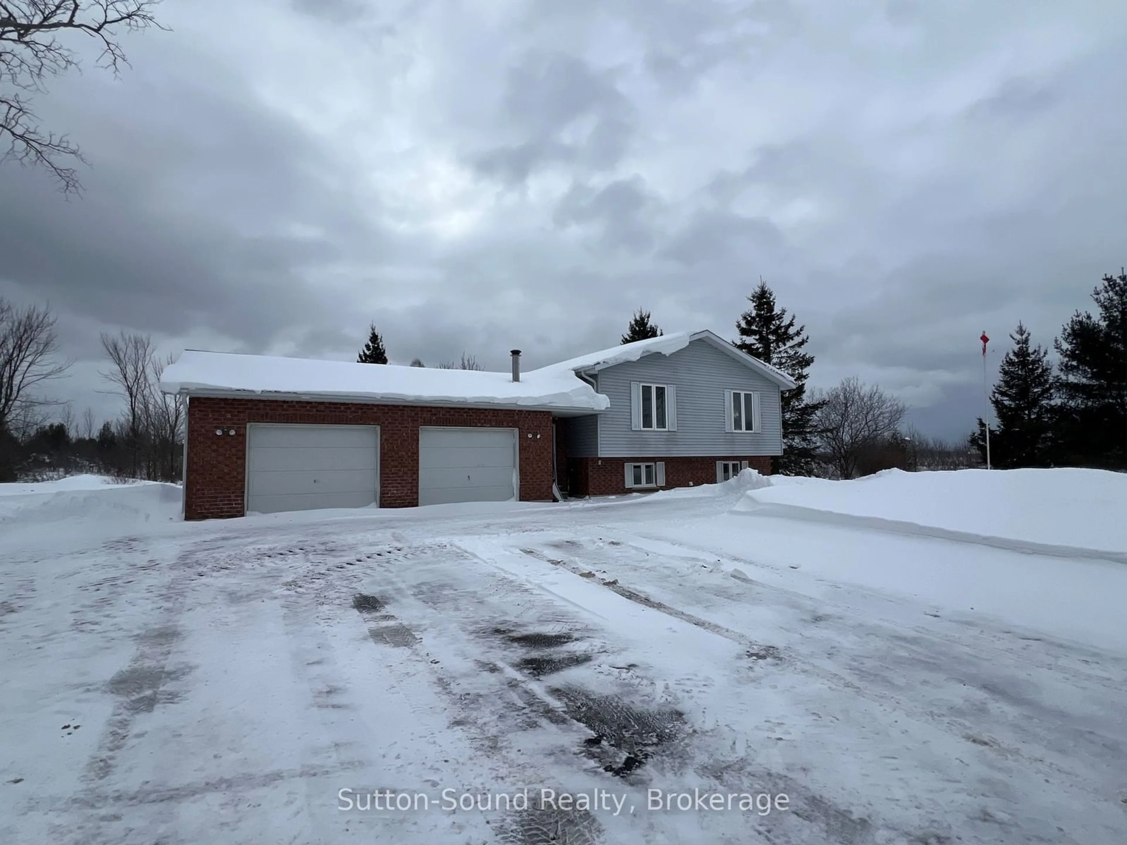 A pic from outside/outdoor area/front of a property/back of a property/a pic from drone, street for 401142 GREY RD 17, Georgian Bluffs Ontario N0H 2T0