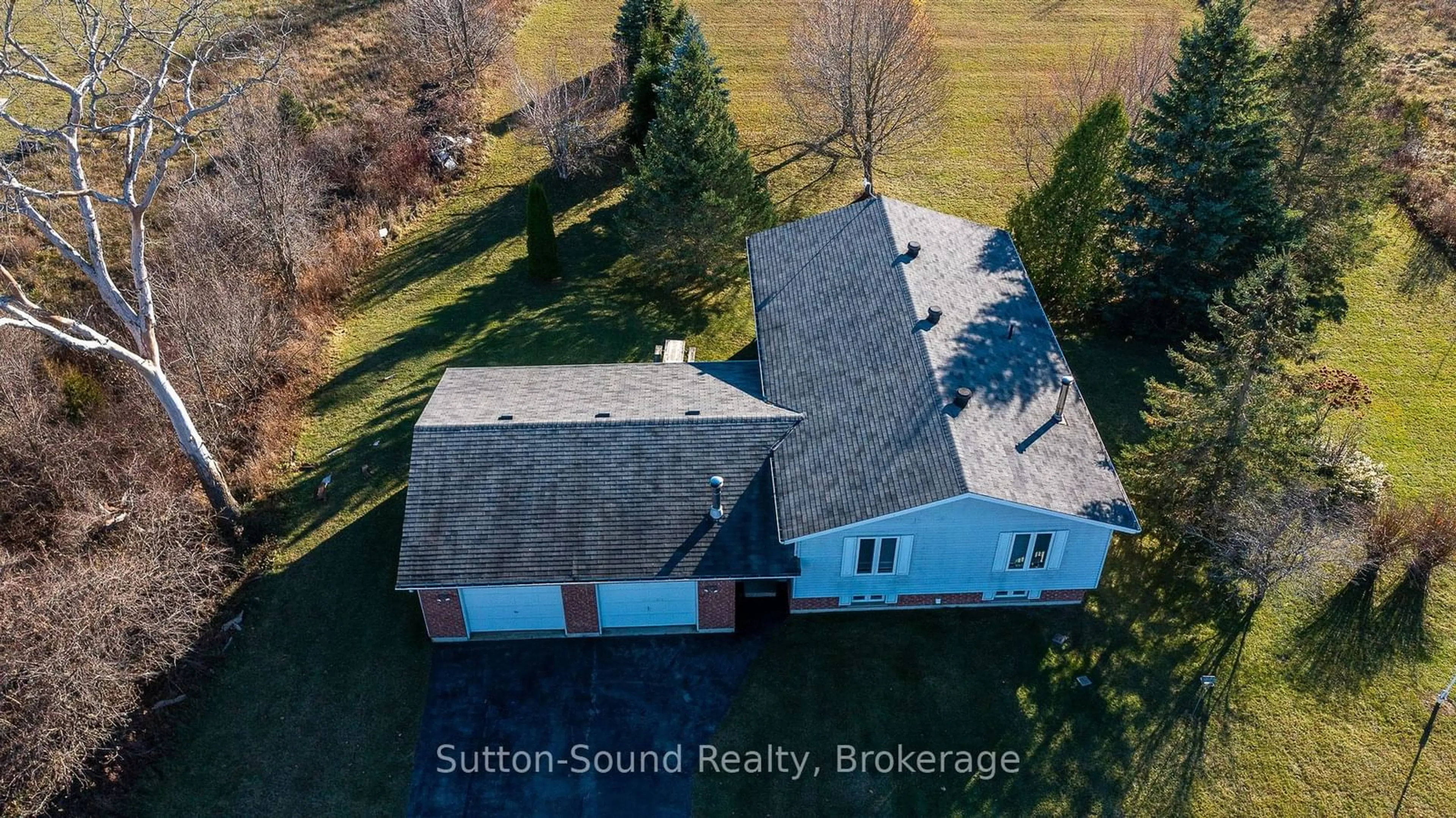 A pic from outside/outdoor area/front of a property/back of a property/a pic from drone, building for 401142 GREY RD 17, Georgian Bluffs Ontario N0H 2T0