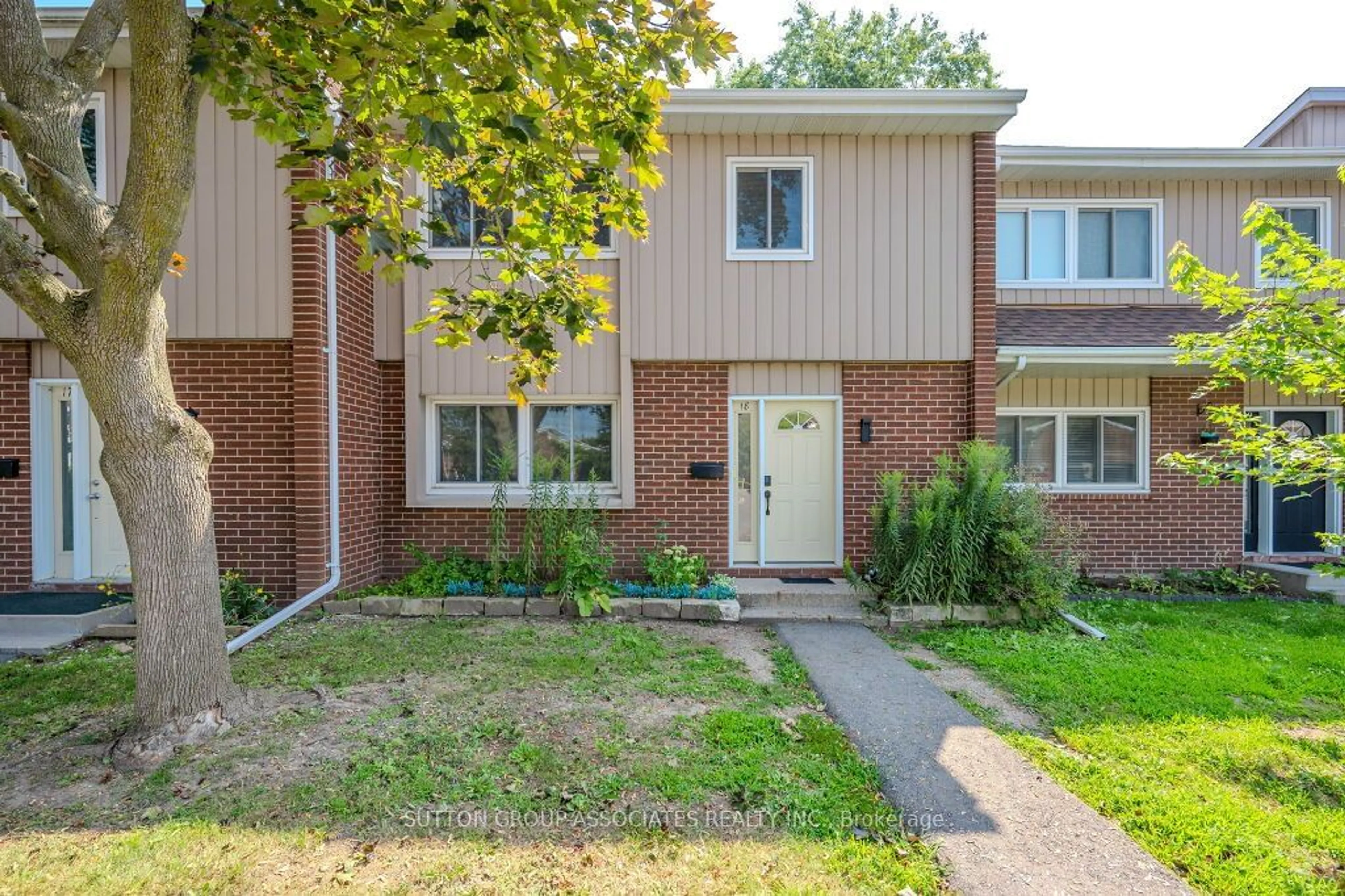 Home with brick exterior material, street for 121 University Ave #18, Waterloo Ontario N2J 2W1