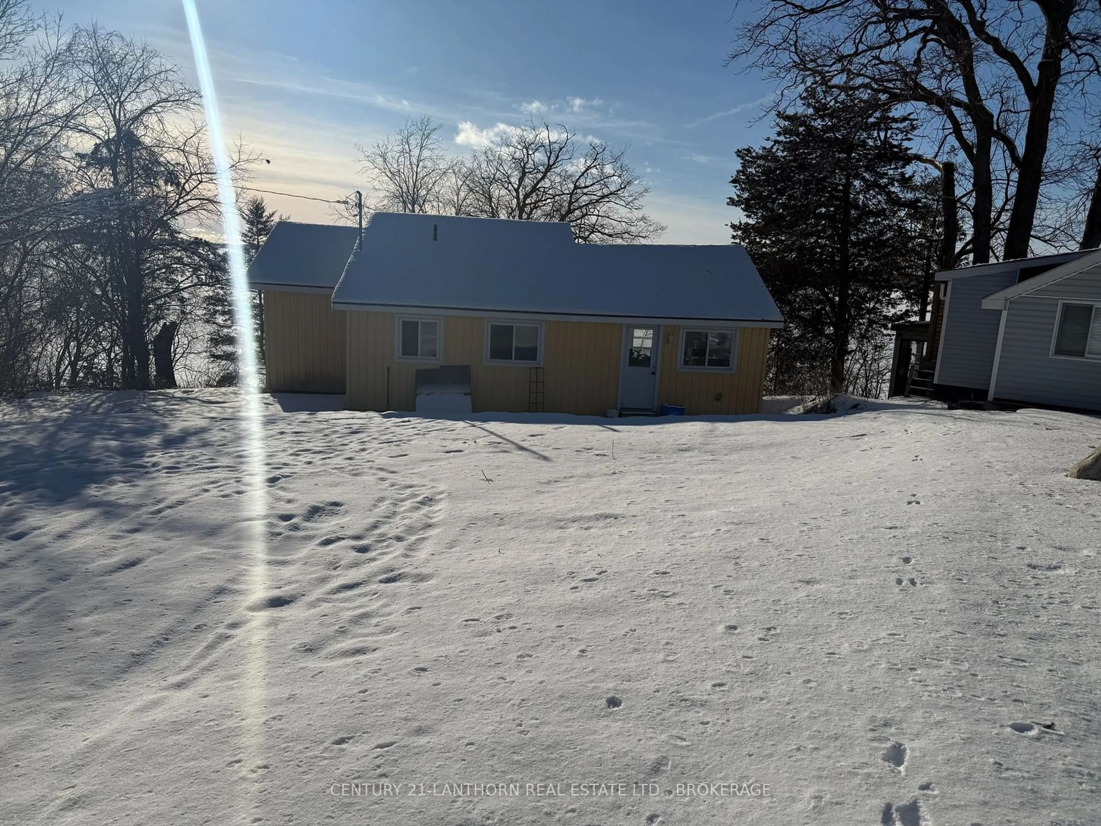 A pic from outside/outdoor area/front of a property/back of a property/a pic from drone, street for 1935 South Shore Rd, Greater Napanee Ontario K7R 3K7