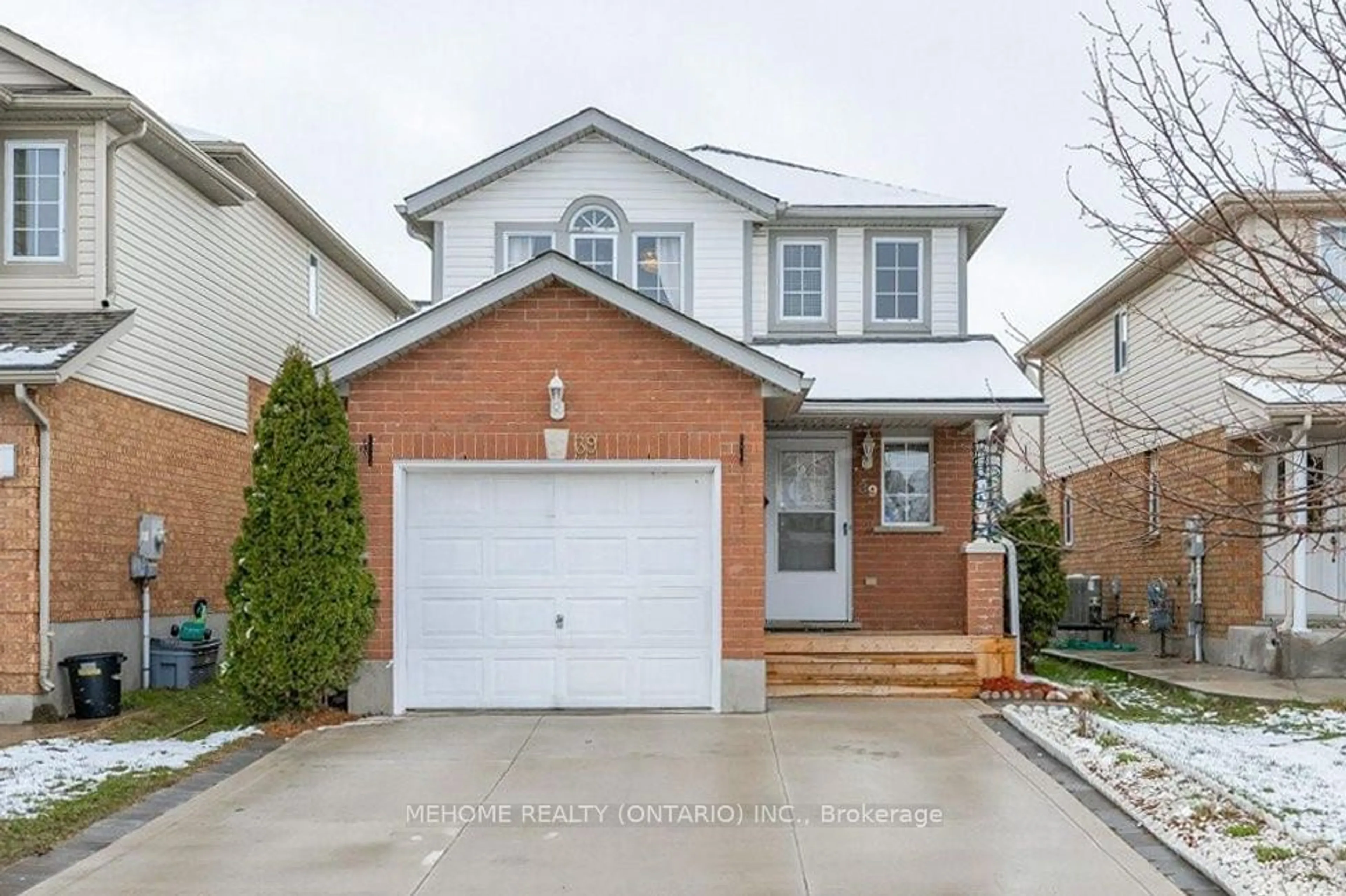 Home with brick exterior material, street for 39 Bridlewreath St, Kitchener Ontario N2E 3V5