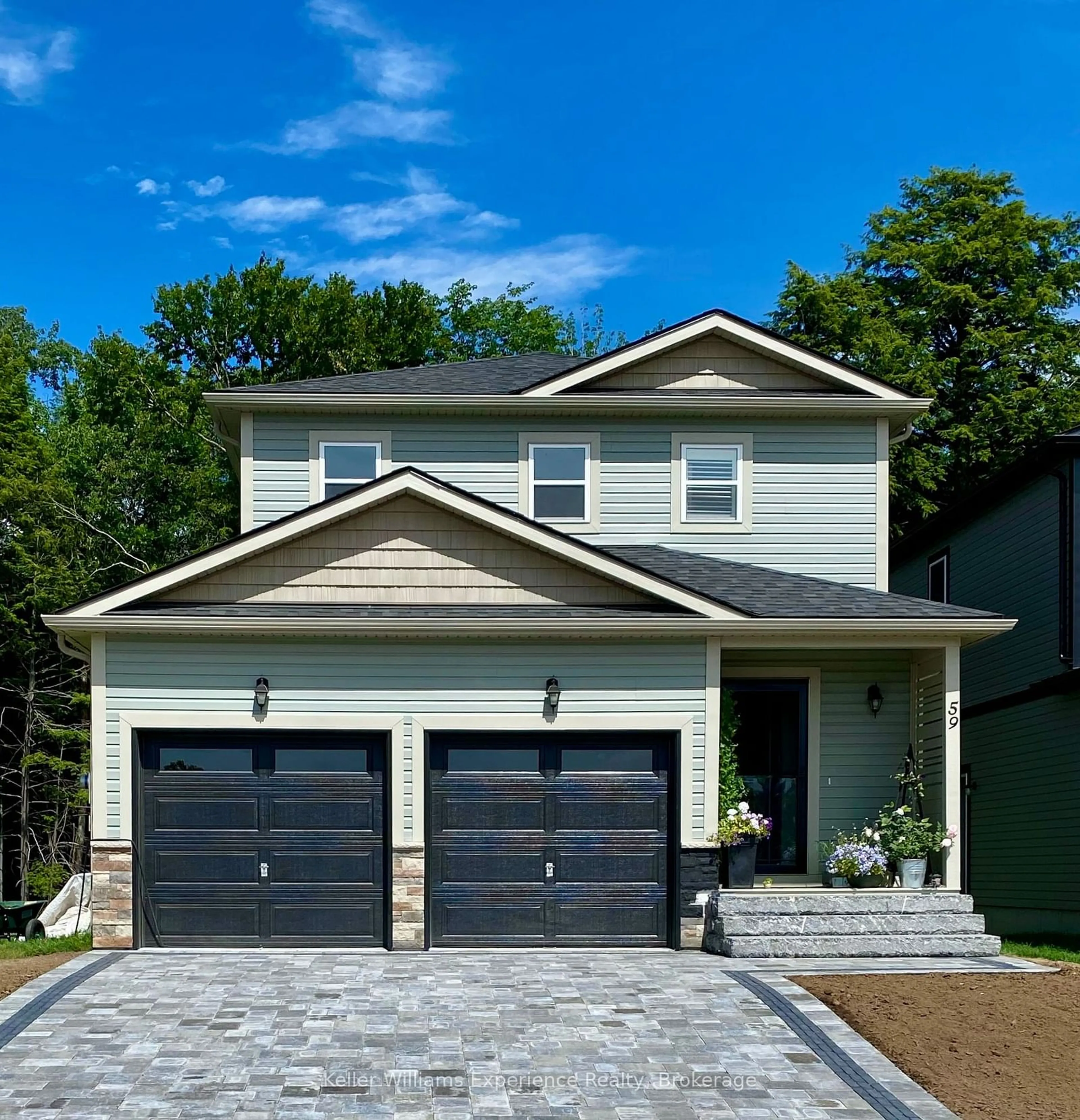 Home with vinyl exterior material, street for 59 Quinn Forest Dr, Bracebridge Ontario P1L 0C8