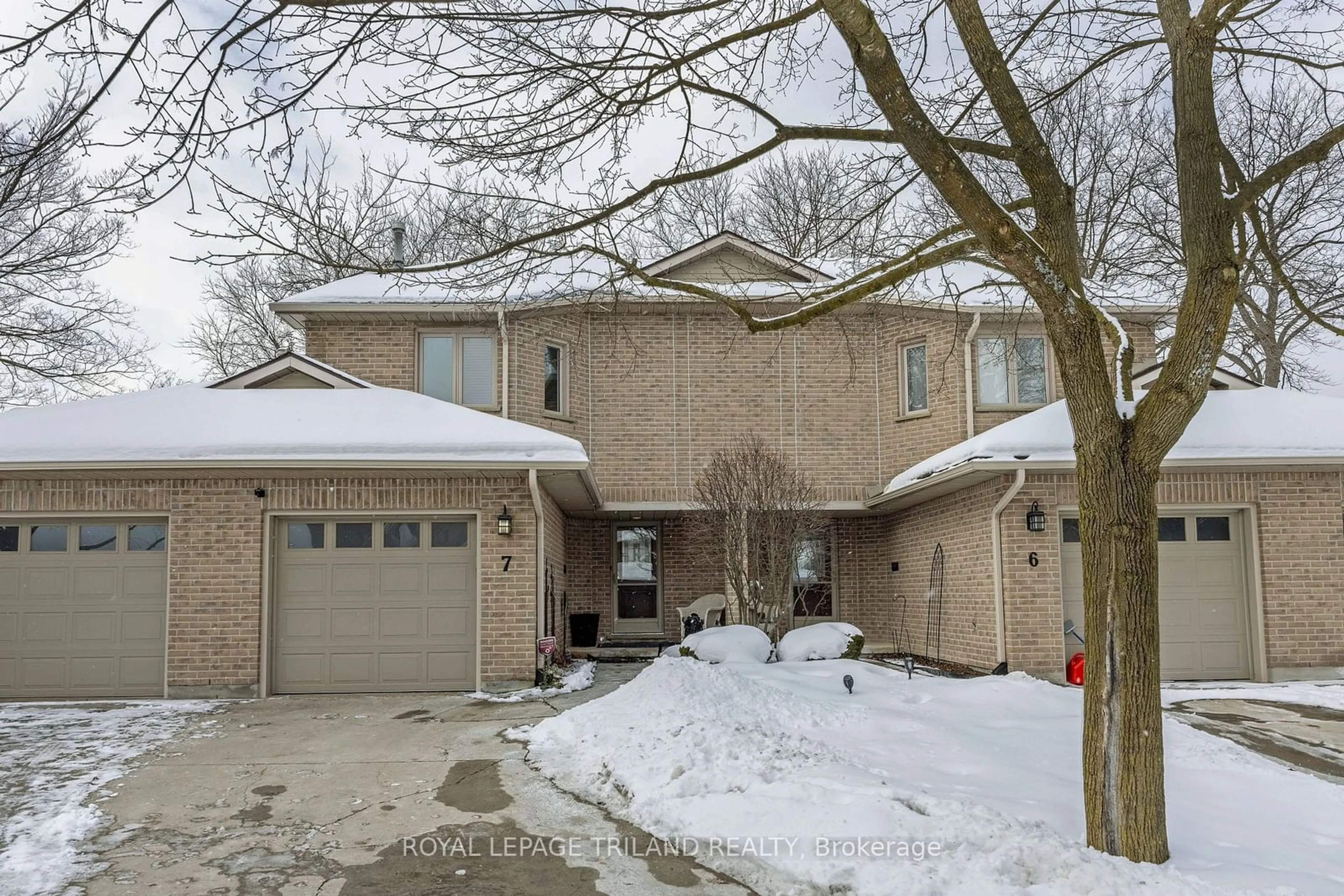 Home with brick exterior material, street for 70 Glenroy Rd #7, London Ontario N5Z 4W9