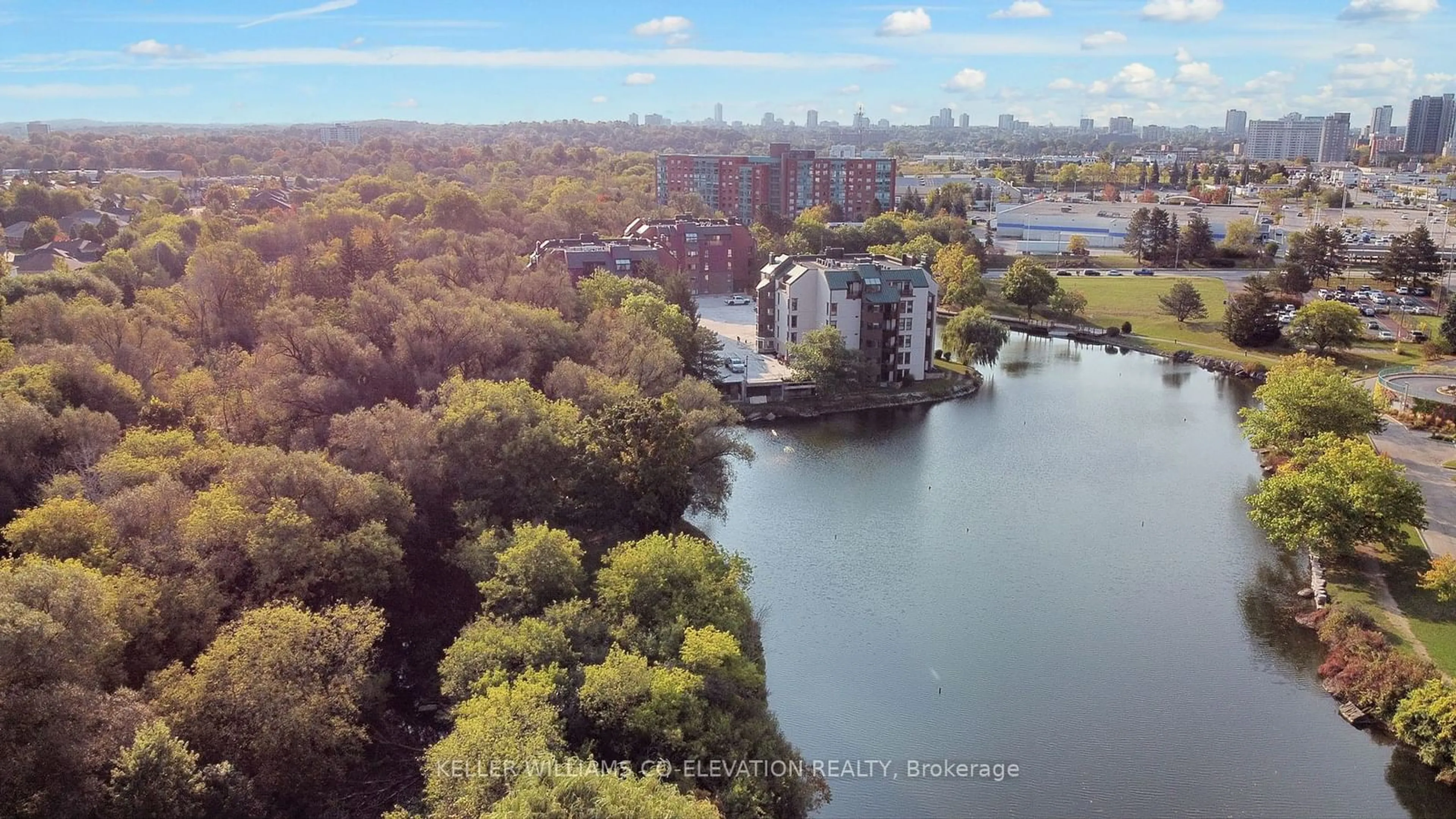 A pic from outside/outdoor area/front of a property/back of a property/a pic from drone, water/lake/river/ocean view for 54 Blue Springs Dr #14, Waterloo Ontario N2J 4M4