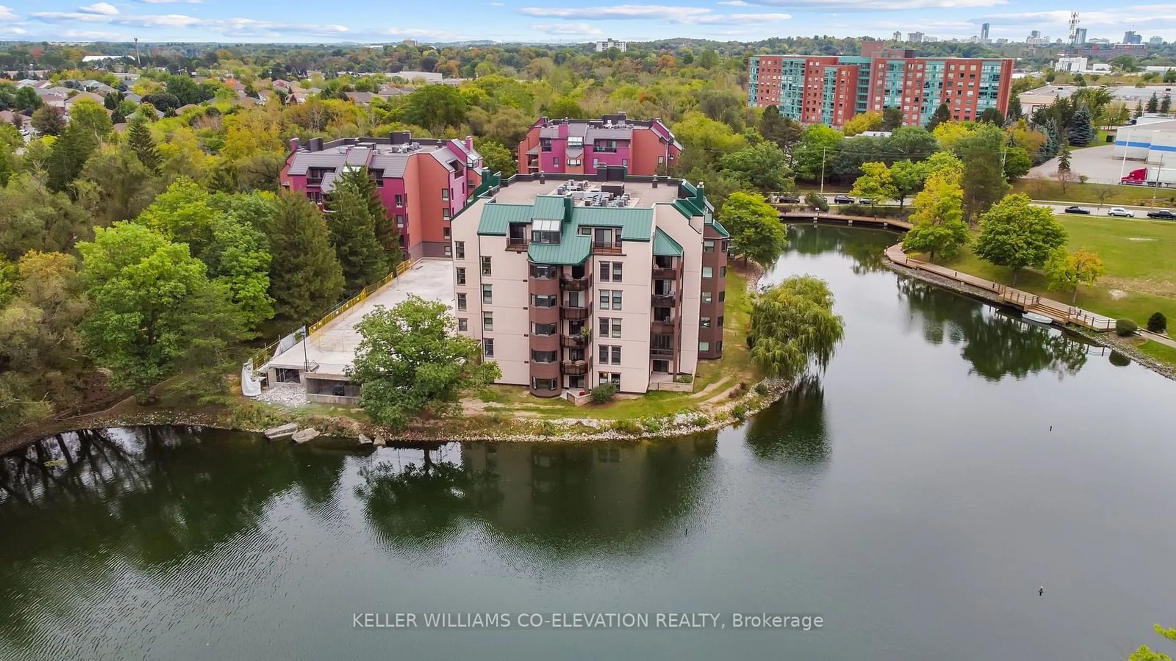 A pic from outside/outdoor area/front of a property/back of a property/a pic from drone, water/lake/river/ocean view for 54 Blue Springs Dr #14, Waterloo Ontario N2J 4M4