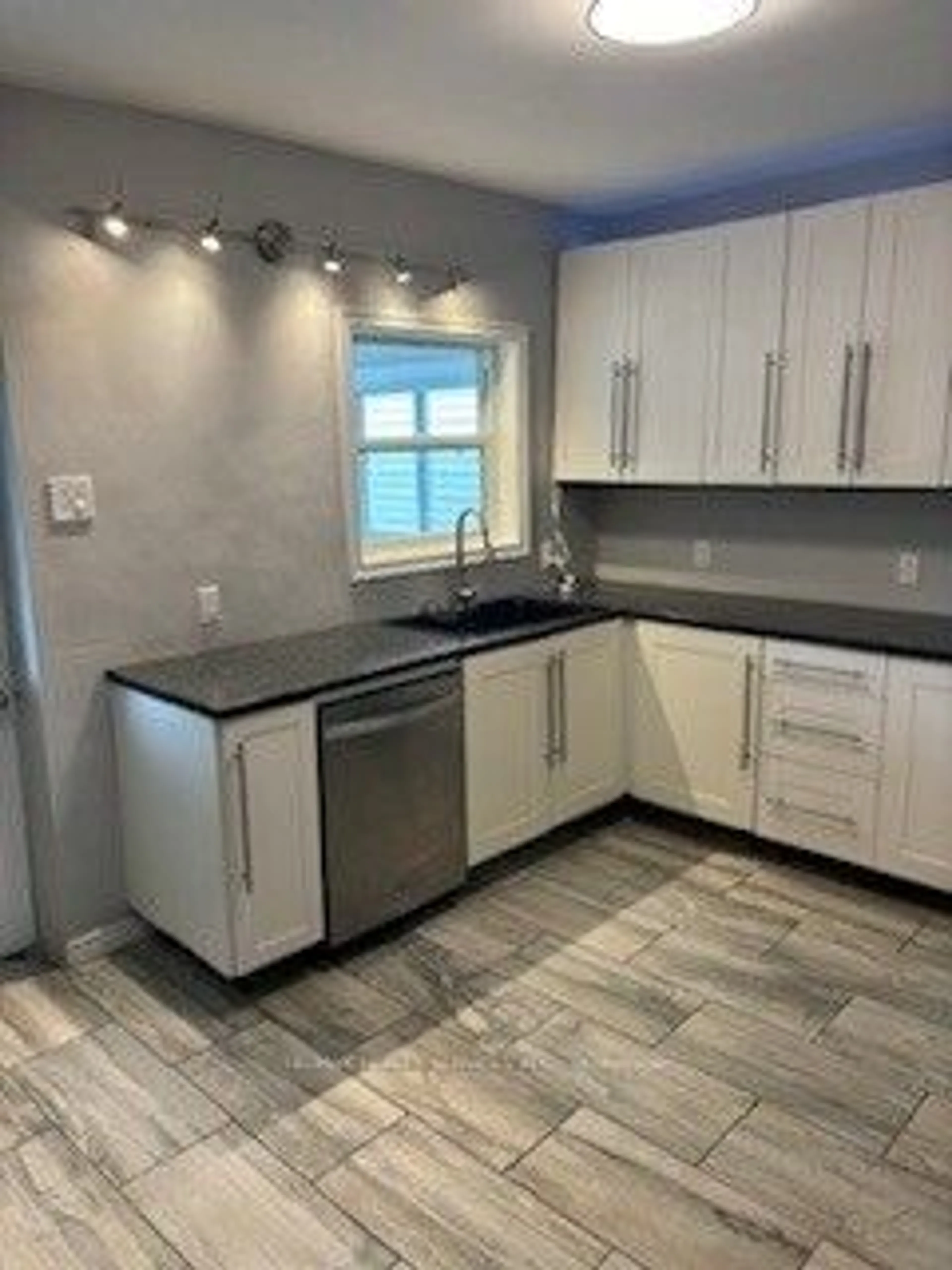 Open concept kitchen, ceramic/tile floor for 14 Clinton St, Hamilton Ontario L8L 3J8