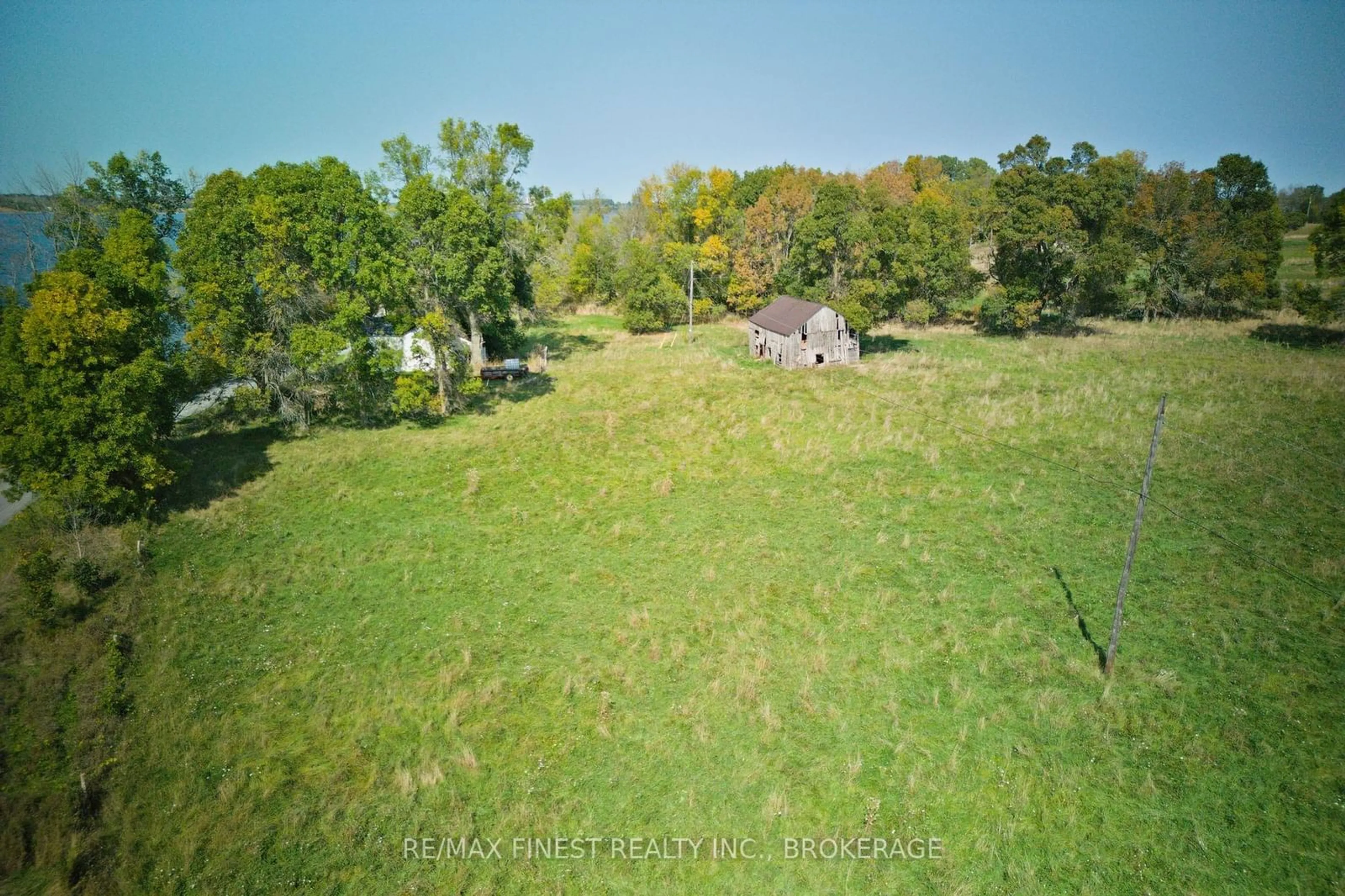 A pic from outside/outdoor area/front of a property/back of a property/a pic from drone, forest/trees view for 15355 FRONT Rd, Stella Ontario K0H 2S0