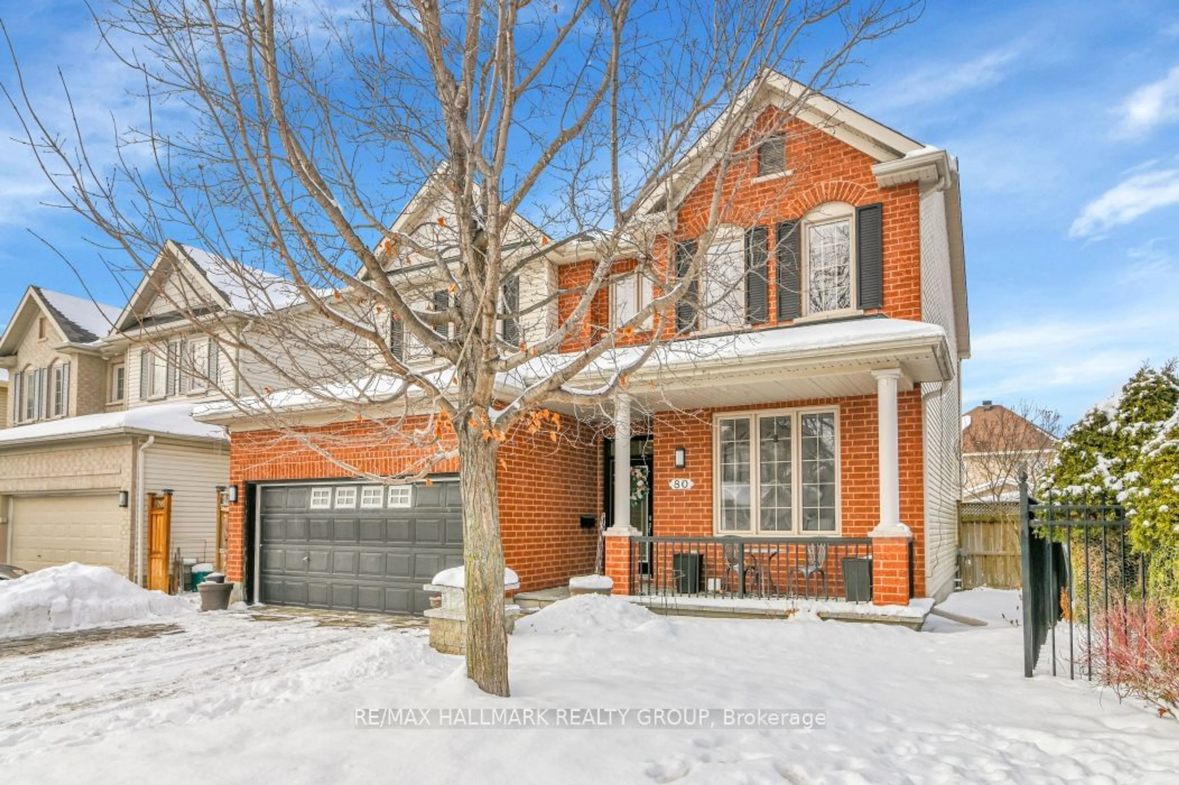 Home with brick exterior material, street for 80 Rodeo Dr, Barrhaven Ontario K2J 5K2