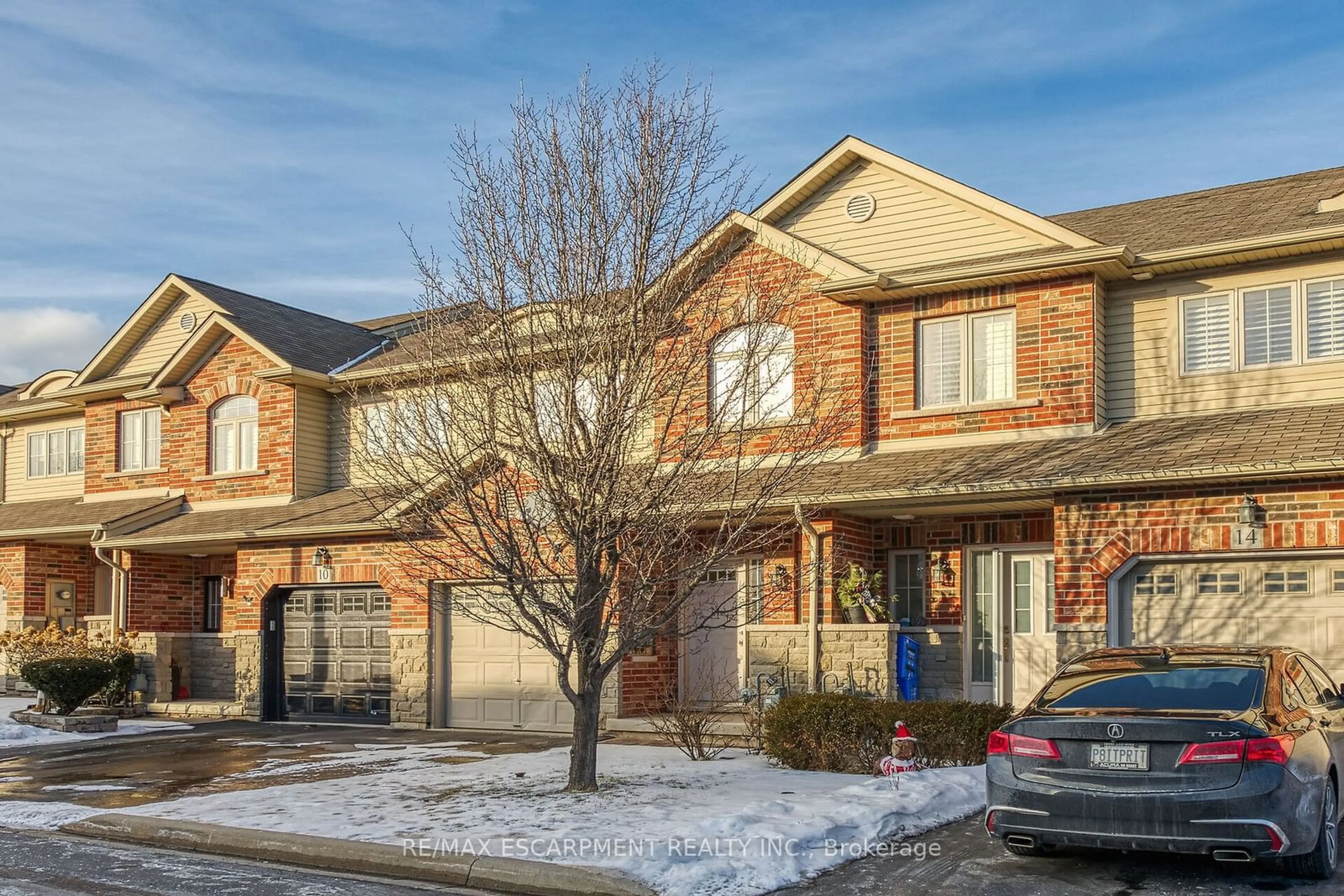 Home with brick exterior material, street for 12 Marina Point Cres, Hamilton Ontario L8E 0E4