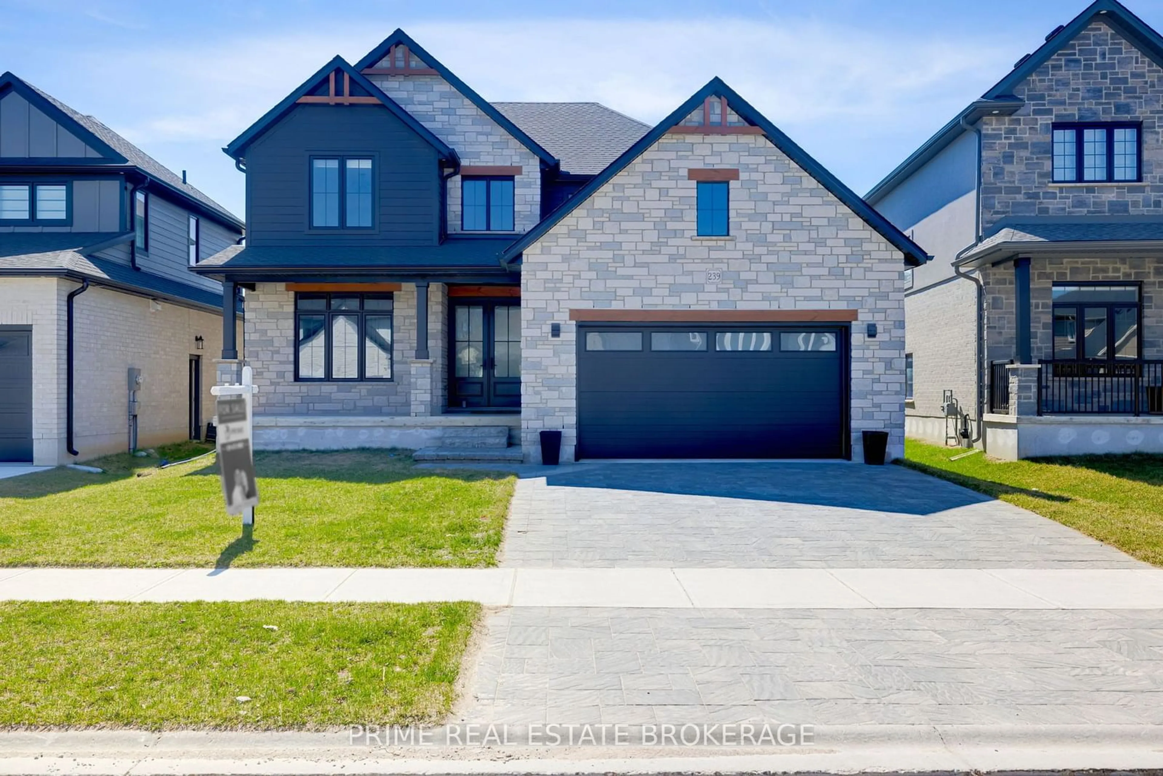 Home with brick exterior material, street for 239 Boardwalk Way, Thames Centre Ontario N0L 1G2