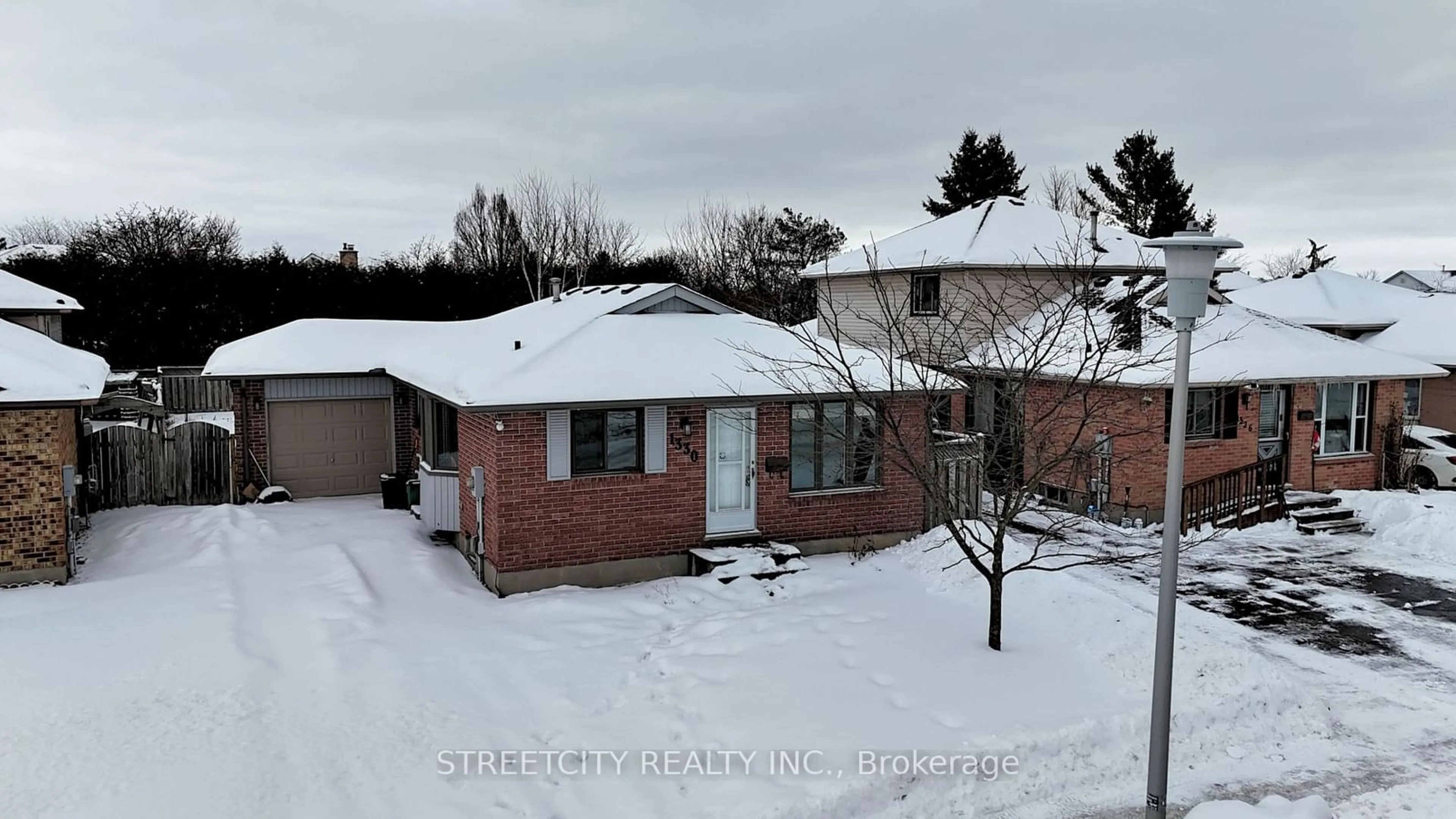 A pic from outside/outdoor area/front of a property/back of a property/a pic from drone, street for 1330 Sandford St, London Ontario N5V 3V5