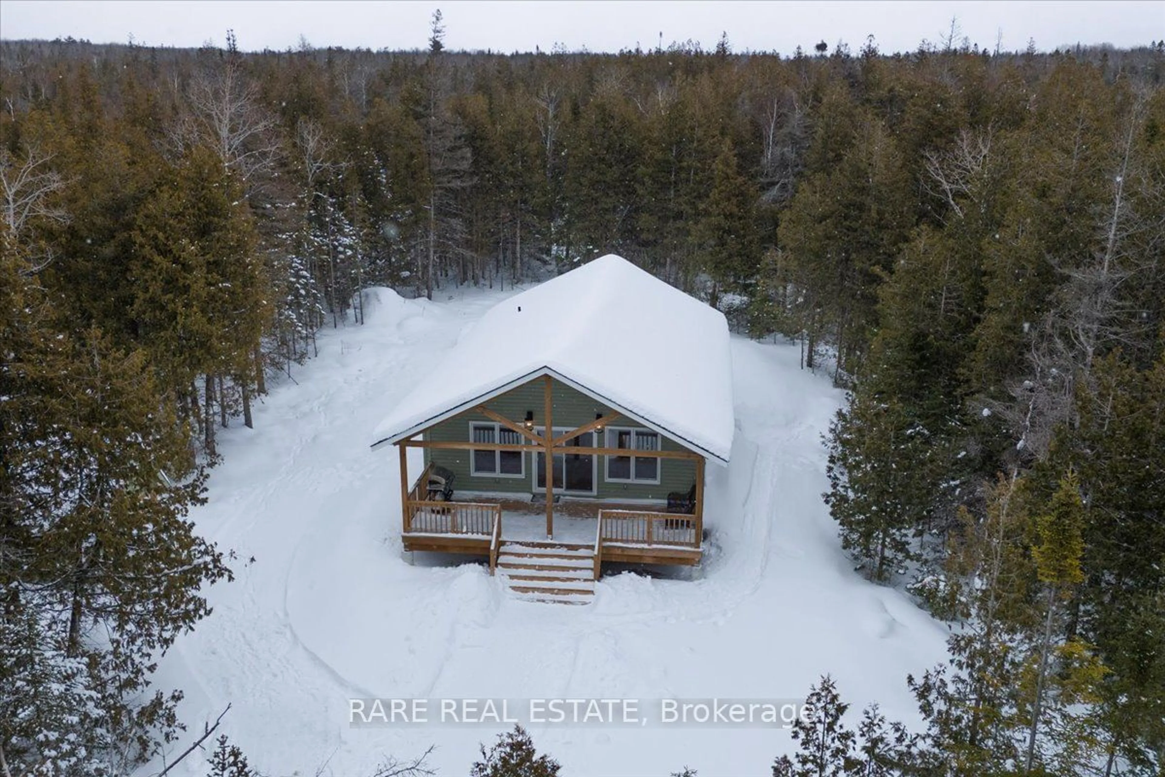 A pic from outside/outdoor area/front of a property/back of a property/a pic from drone, water/lake/river/ocean view for 6 Pike St, Northern Bruce Peninsula Ontario N0H 1W0