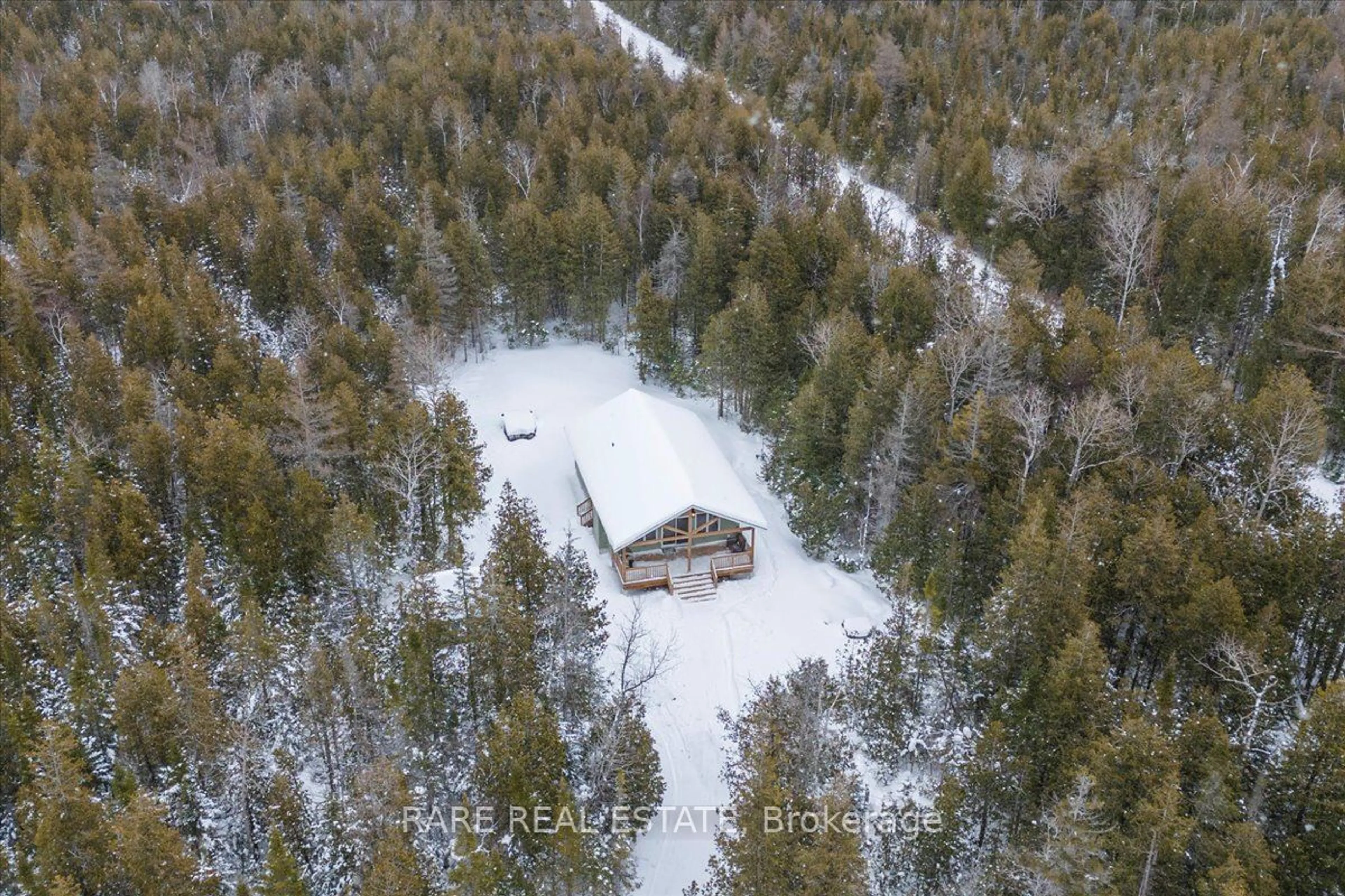 A pic from outside/outdoor area/front of a property/back of a property/a pic from drone, forest/trees view for 6 Pike St, Northern Bruce Peninsula Ontario N0H 1W0