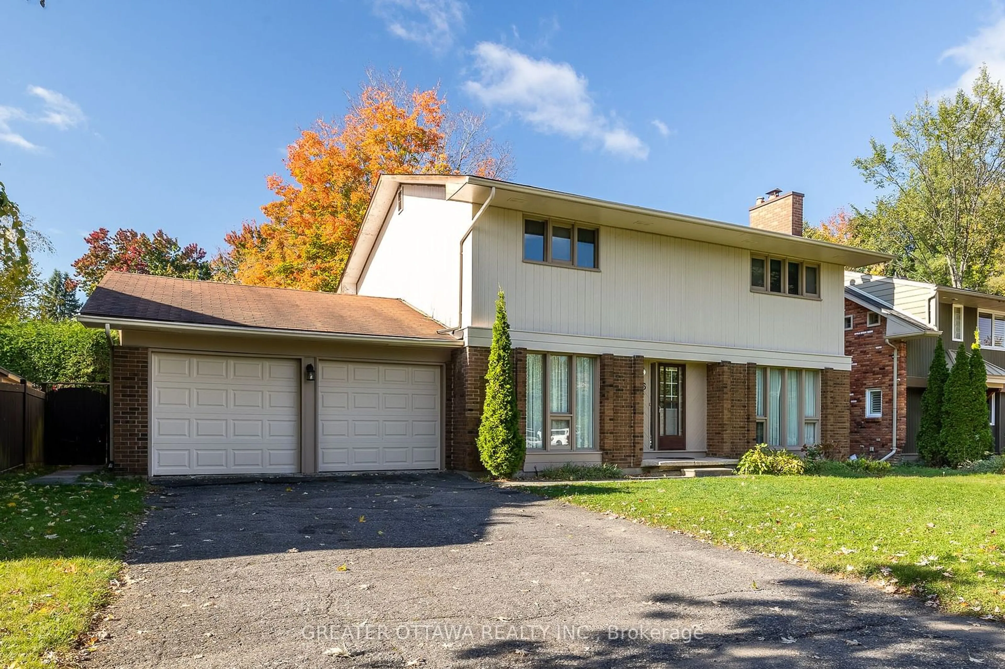 Home with vinyl exterior material, street for 15 Rutherford Cres, Ottawa Ontario K2K 1N1