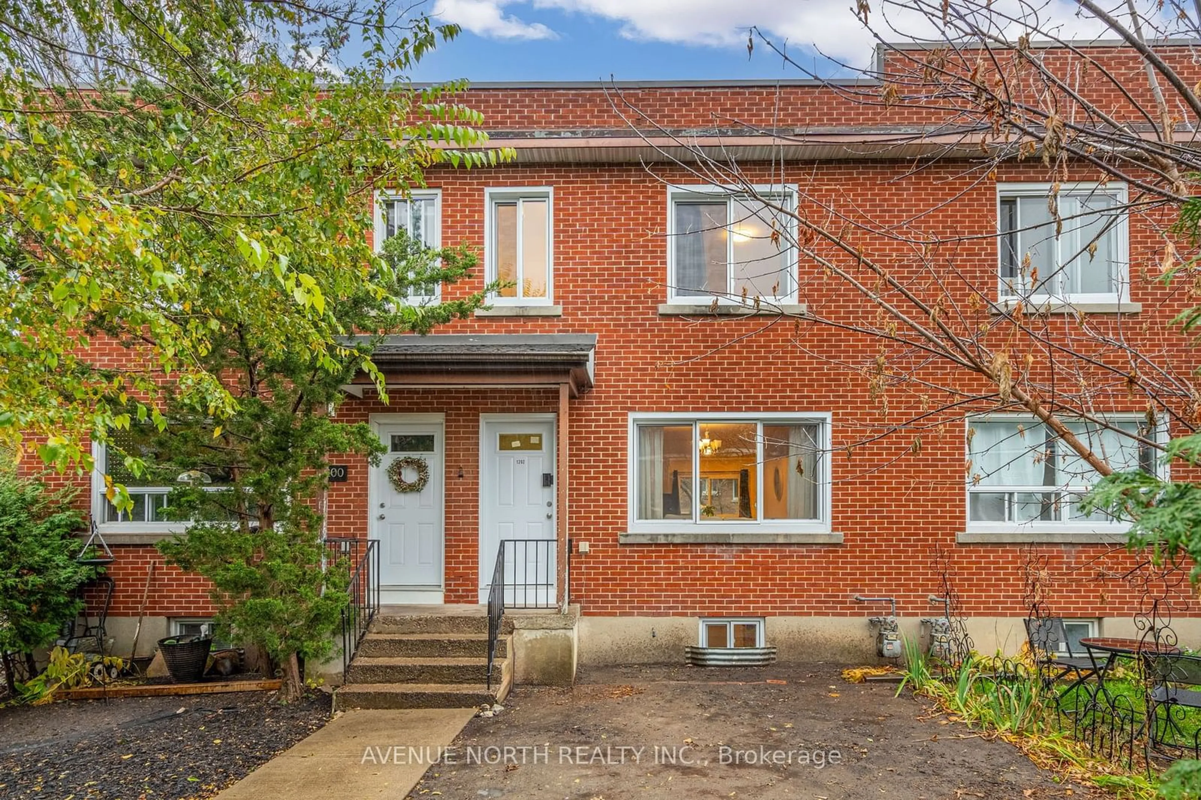 Home with brick exterior material, street for 1202 Summerville Ave, Carlington - Central Park Ontario K1Z 8G4