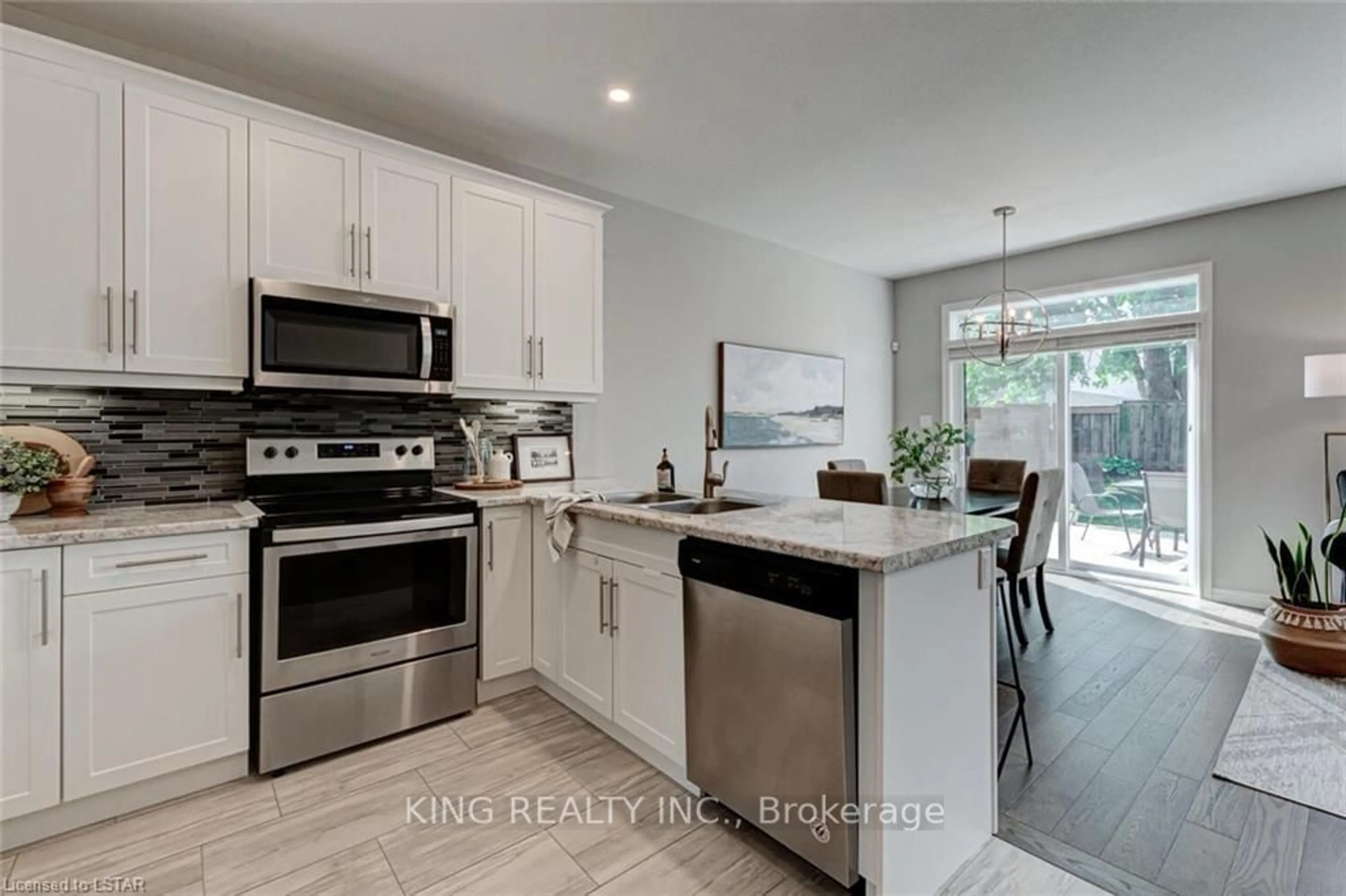 Open concept kitchen, ceramic/tile floor for 1671 valhalla St, London Ontario N6G 5K5