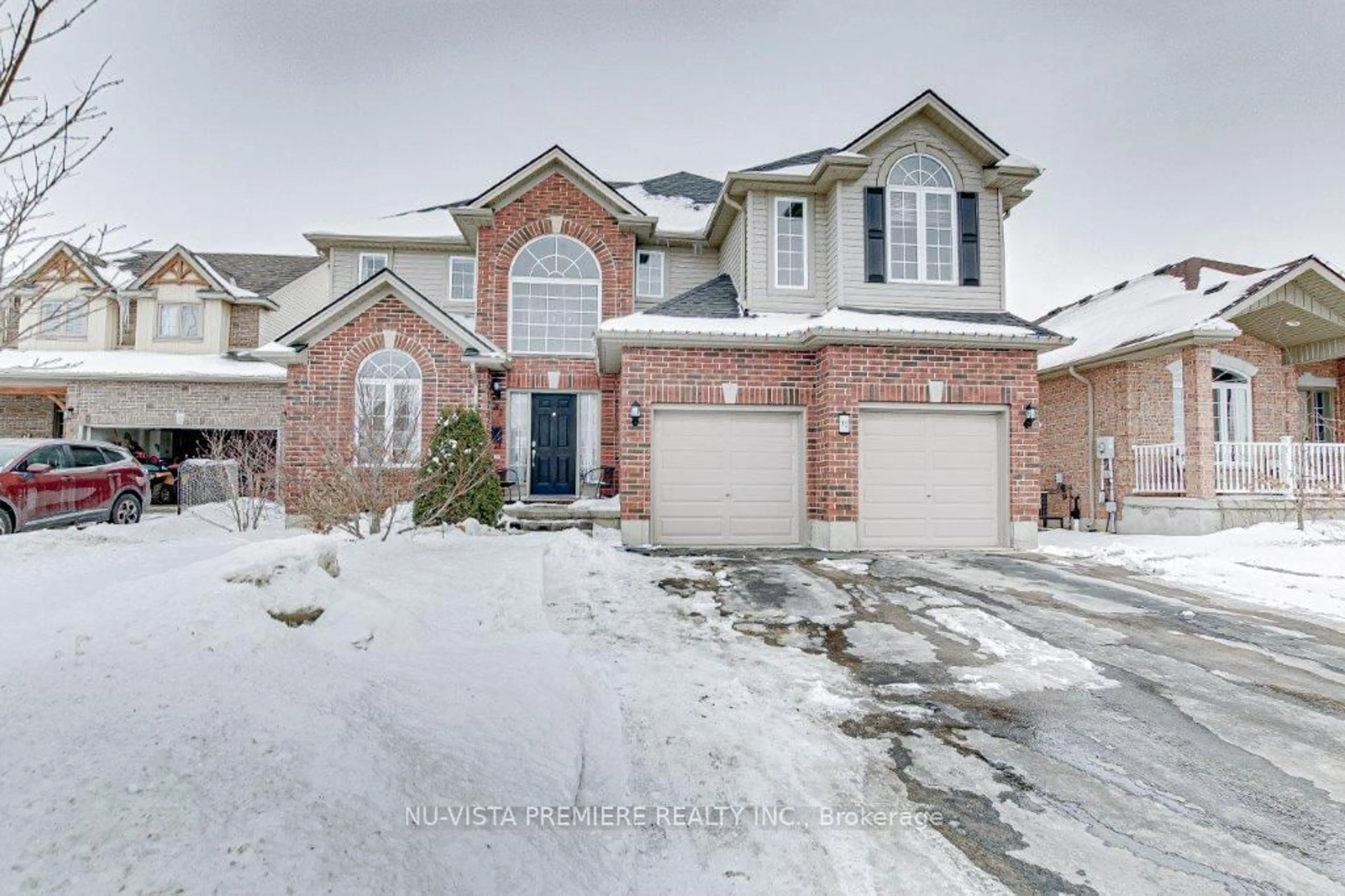 Home with brick exterior material, street for 82 Woodlily Lane, Middlesex Centre Ontario N0M 2A0