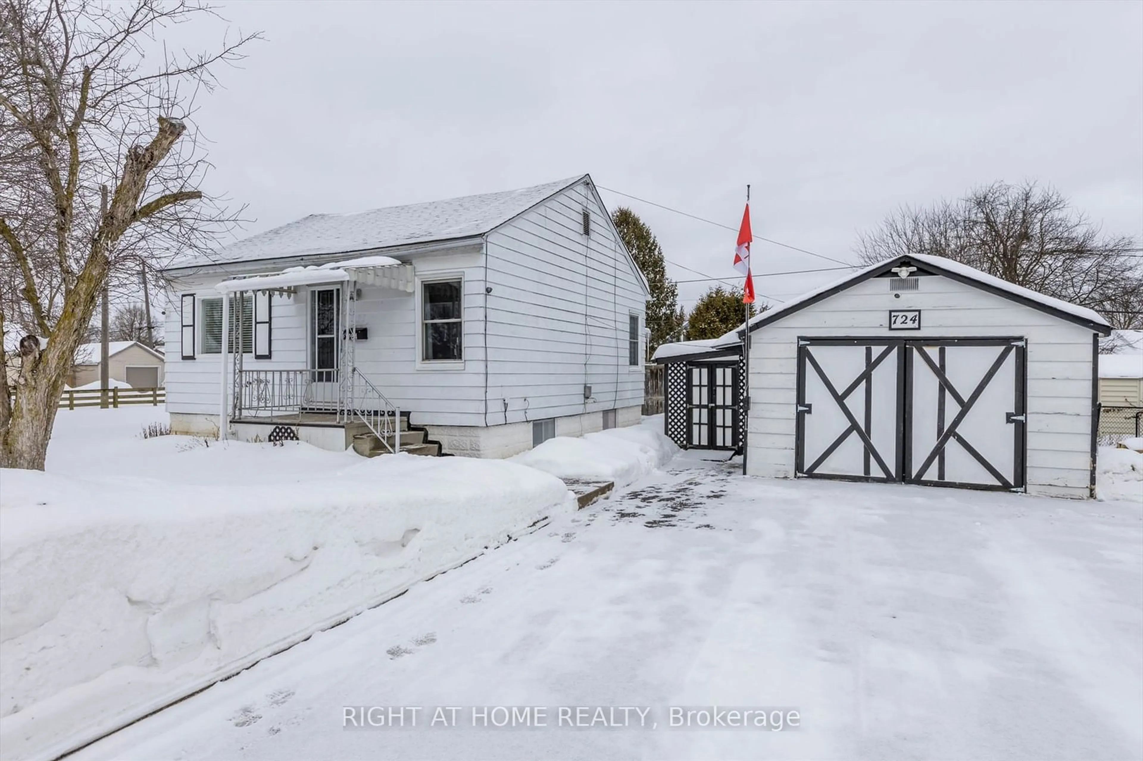 A pic from outside/outdoor area/front of a property/back of a property/a pic from drone, street for 724 New Romaine St, Peterborough Ontario K9J 2E8