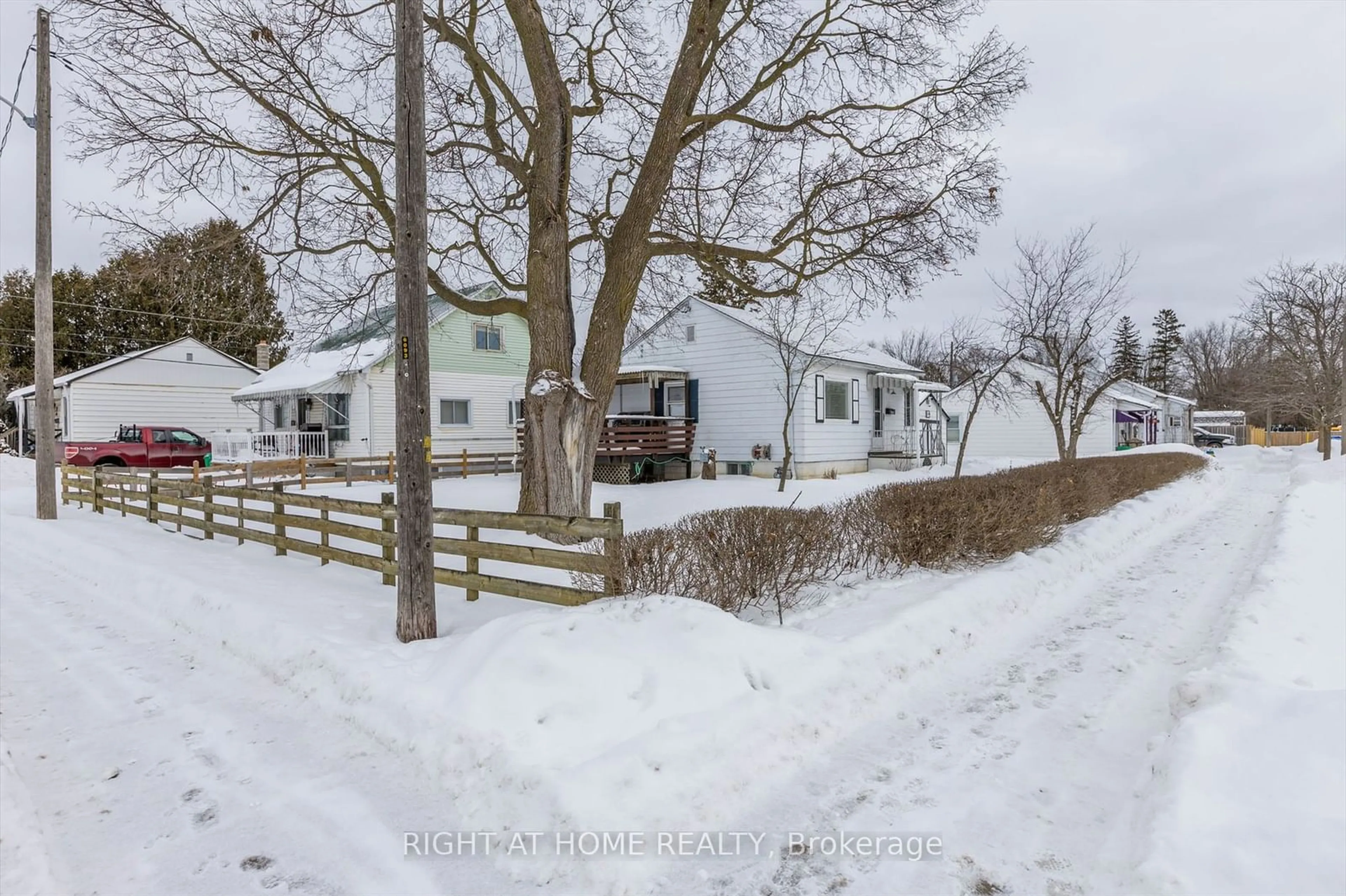 A pic from outside/outdoor area/front of a property/back of a property/a pic from drone, street for 724 New Romaine St, Peterborough Ontario K9J 2E8