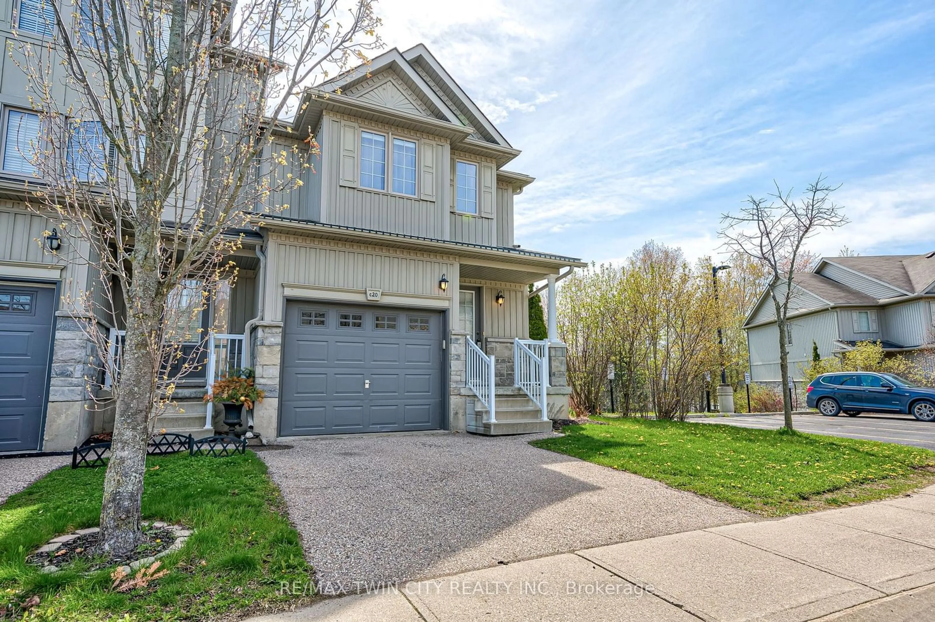 Home with vinyl exterior material, street for 20 David Bergey Dr #C20, Kitchener Ontario N2E 0B1