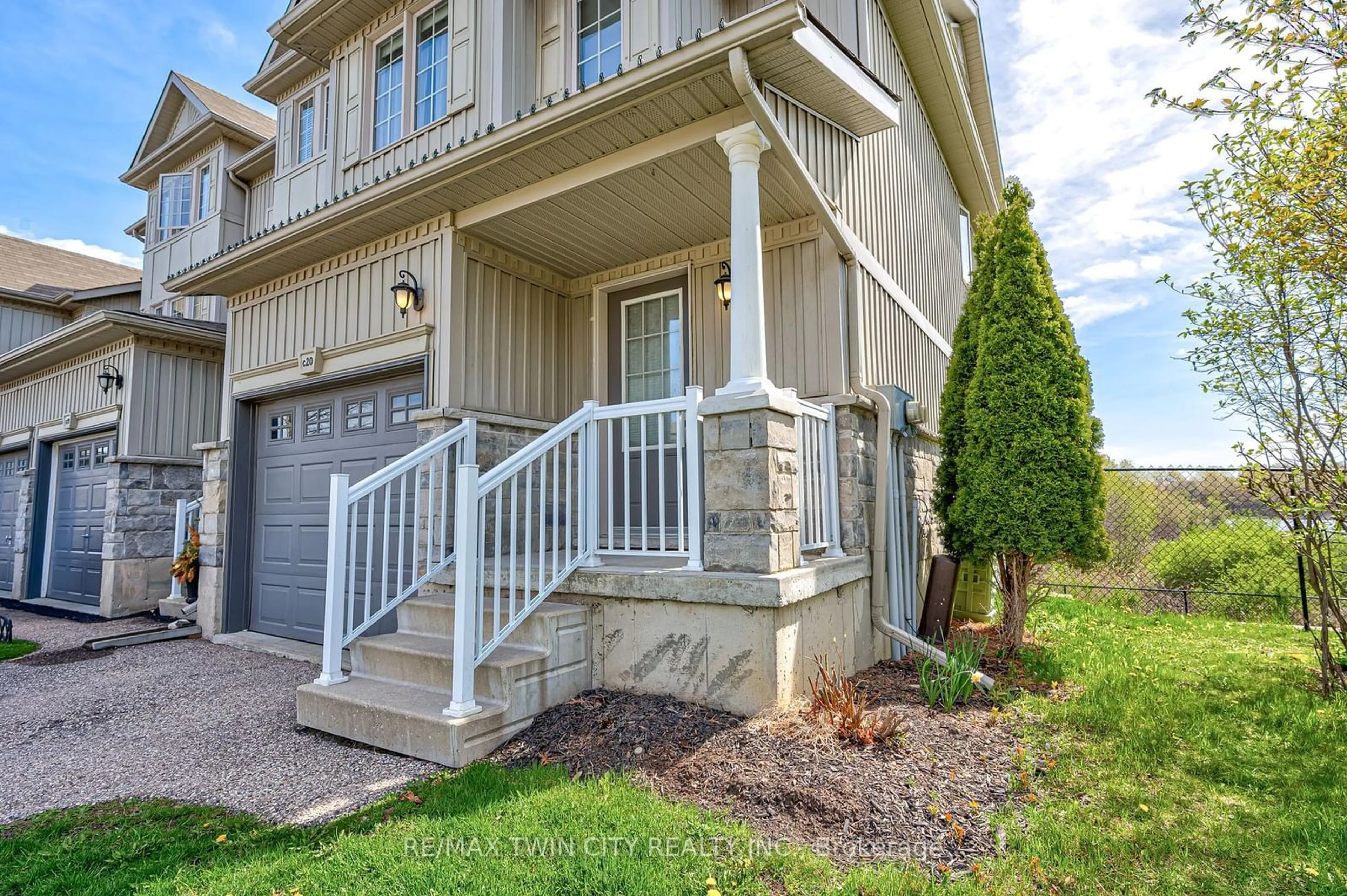 Home with vinyl exterior material, street for 20 David Bergey Dr #C20, Kitchener Ontario N2E 0B1