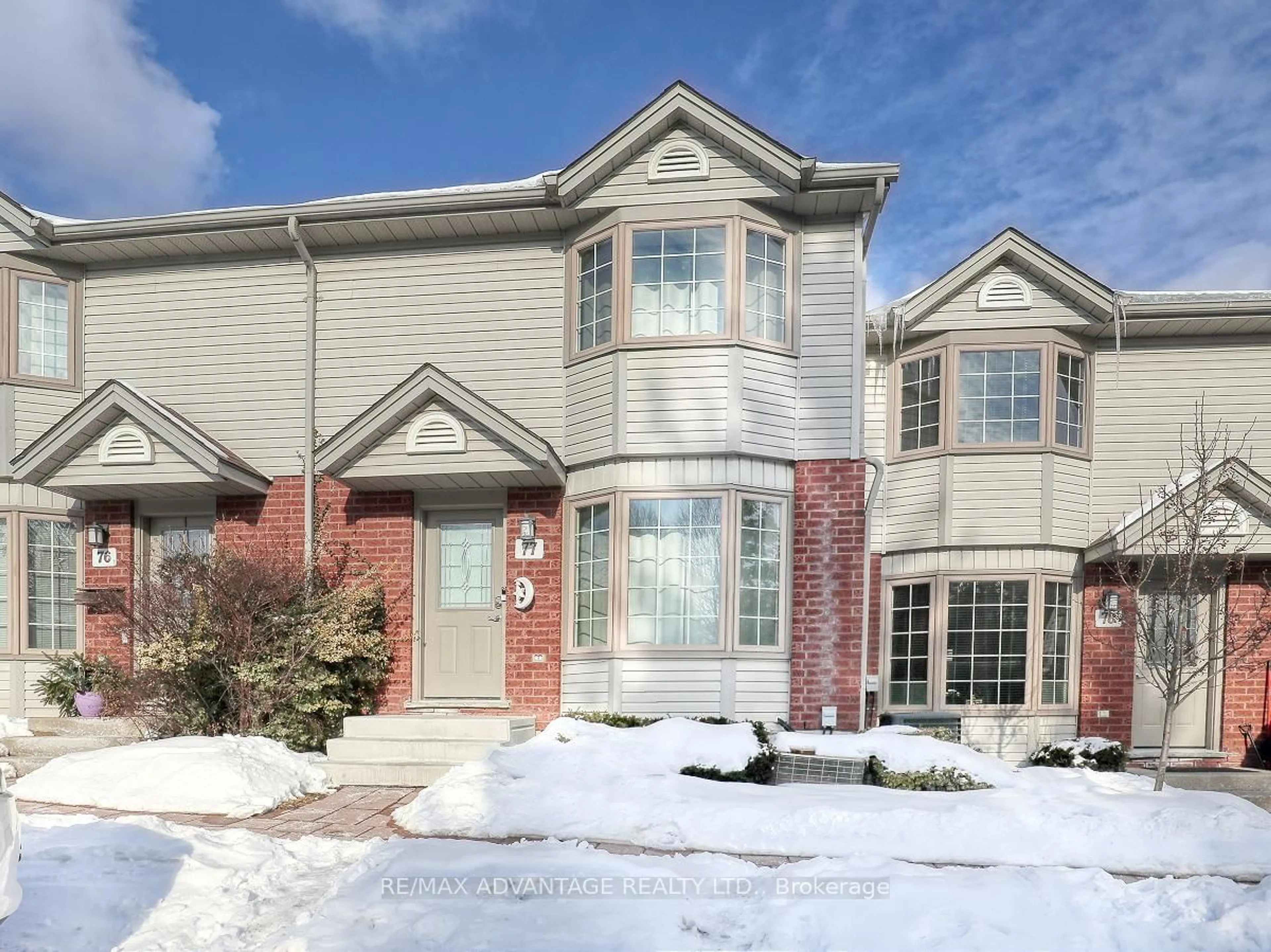 Home with brick exterior material, street for 70 Chapman Crt #77, London Ontario N6G 4Z4