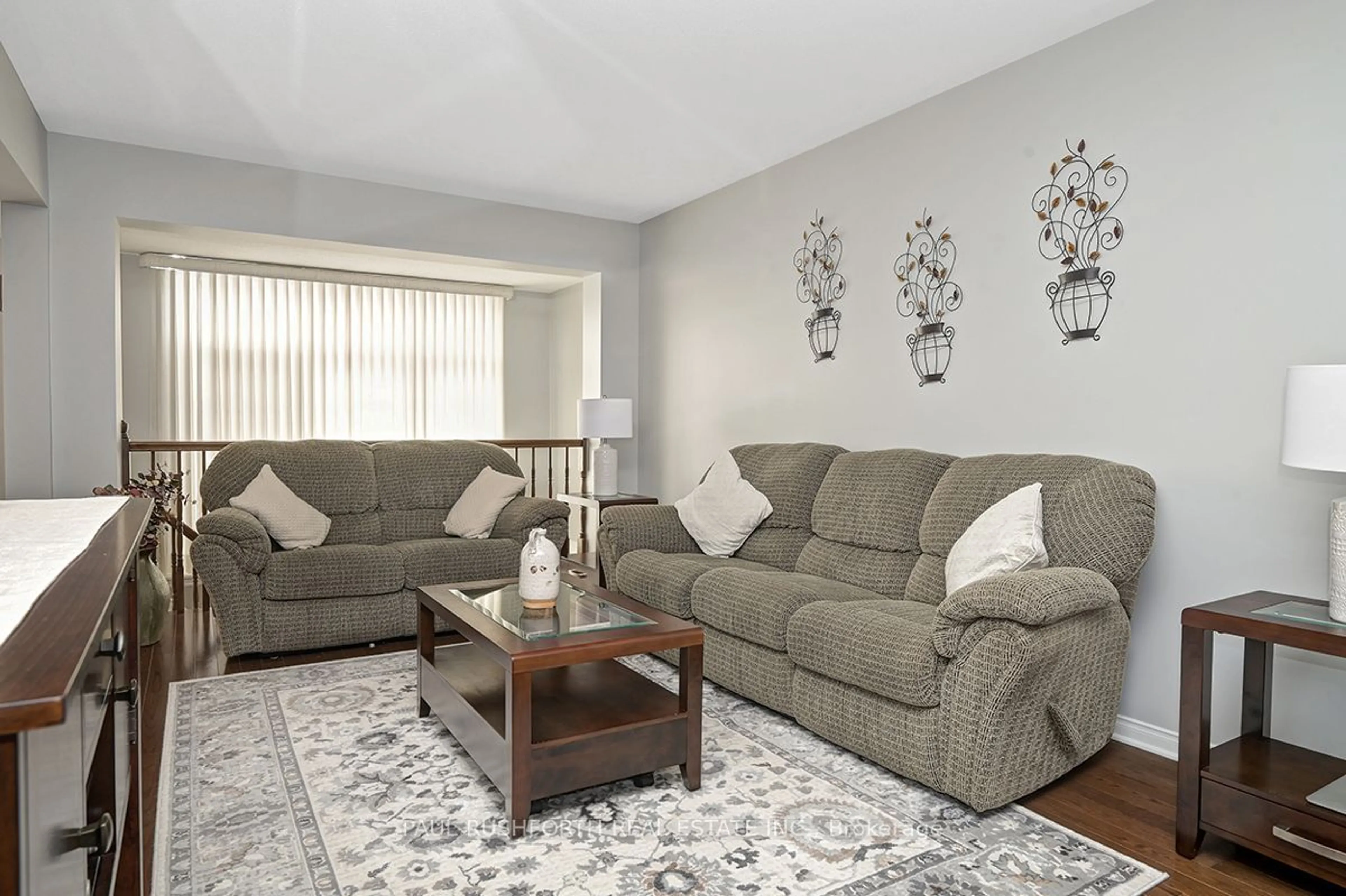 Living room with furniture, carpet floor for 654 Kilbirnie Dr, Barrhaven Ontario K2J 0G8