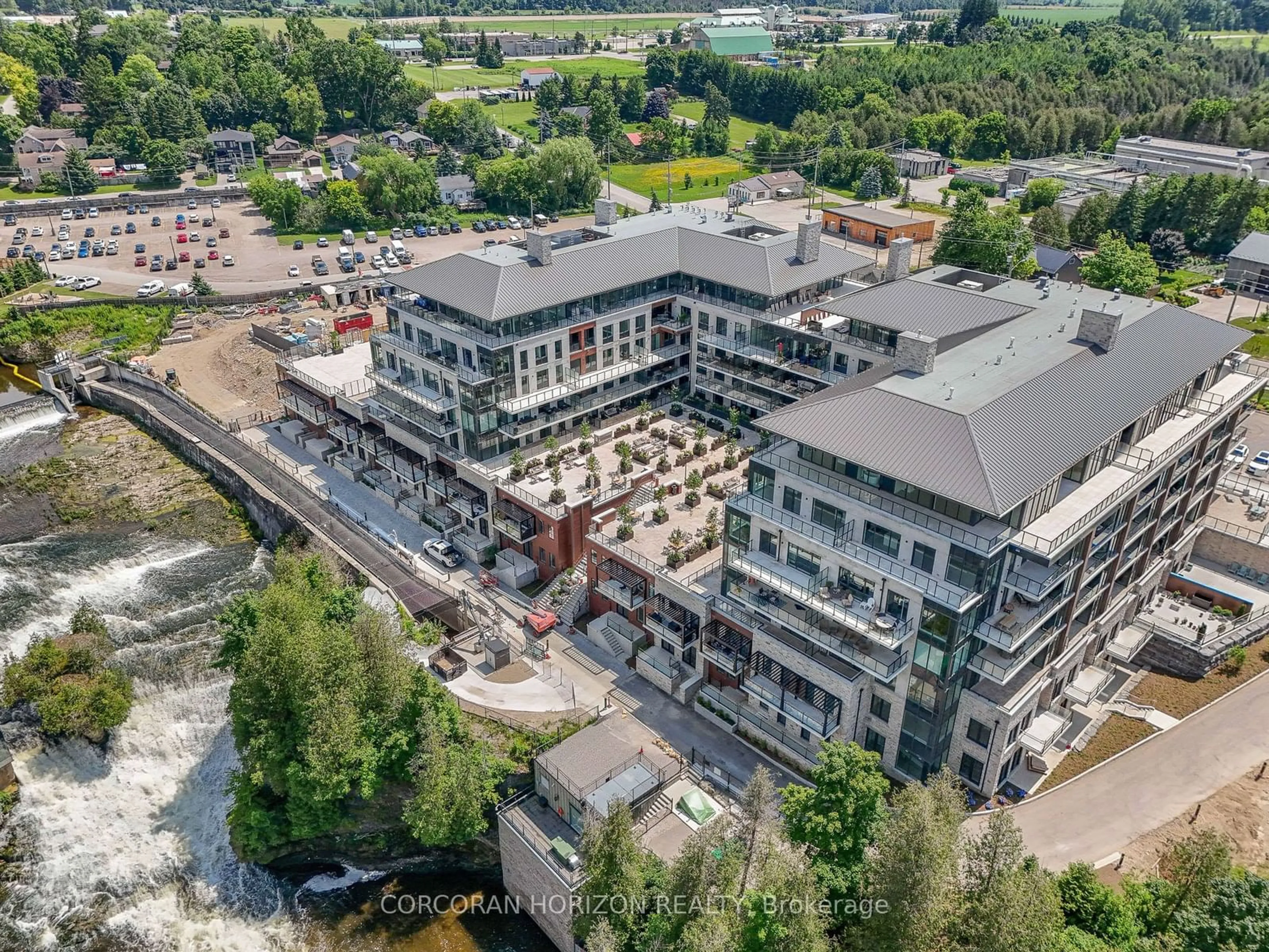 A pic from outside/outdoor area/front of a property/back of a property/a pic from drone, city buildings view from balcony for 6523 Wellington 7 Rd #RS127, Centre Wellington Ontario N0B 1S0