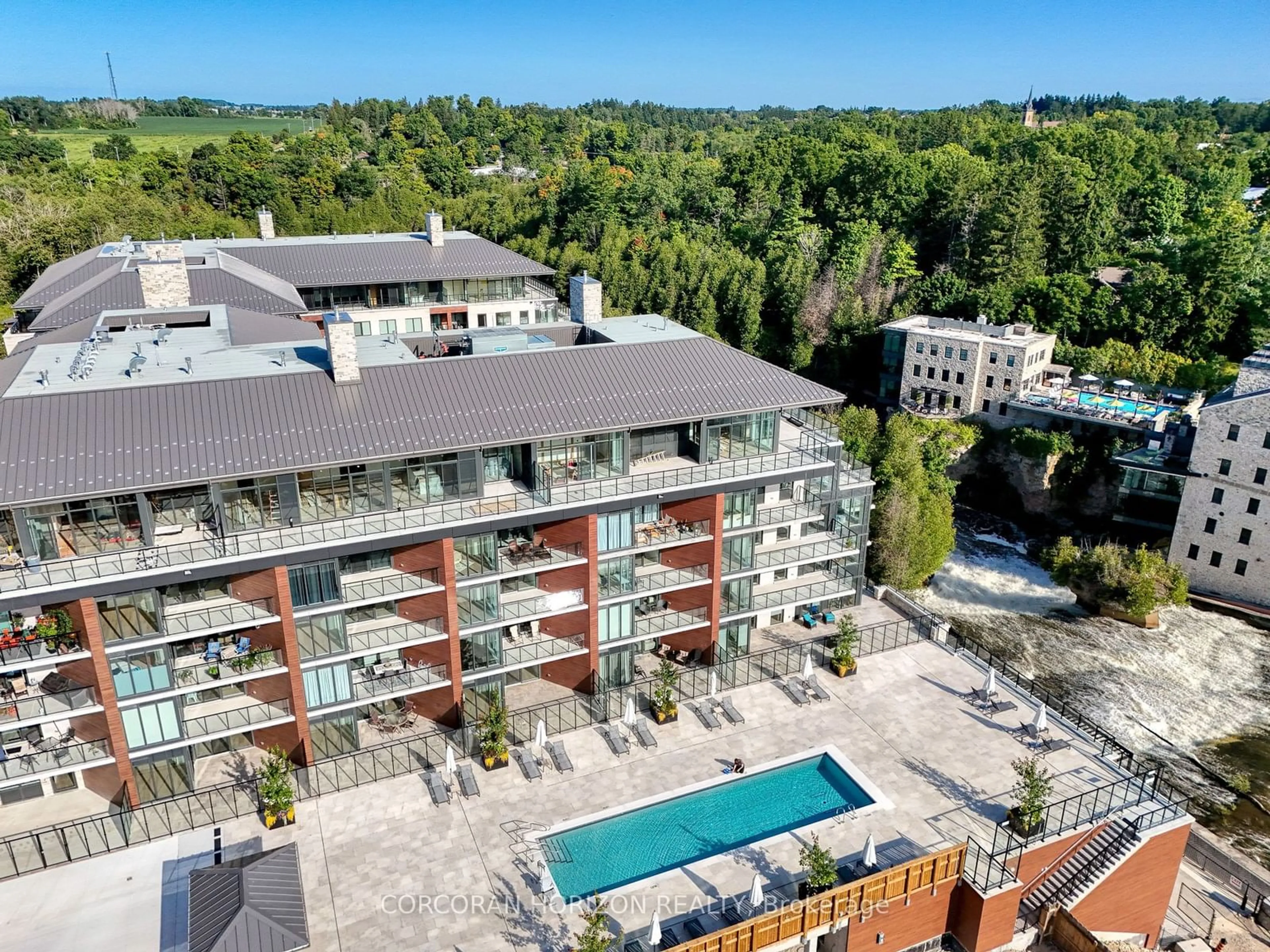 A pic from outside/outdoor area/front of a property/back of a property/a pic from drone, city buildings view from balcony for 6523 Wellington 7 Rd #RS127, Centre Wellington Ontario N0B 1S0