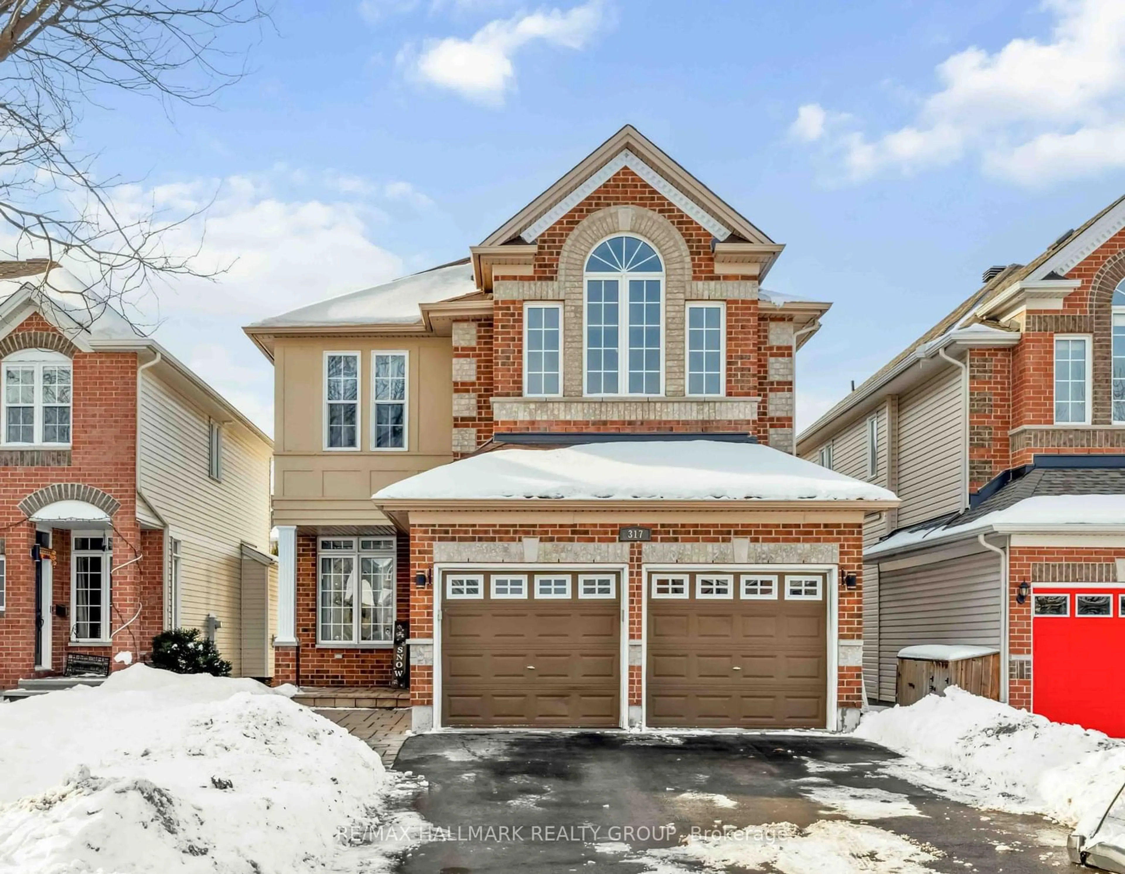 Home with brick exterior material, street for 317 Kinghorn Cres, Kanata Ontario K2K 3R6