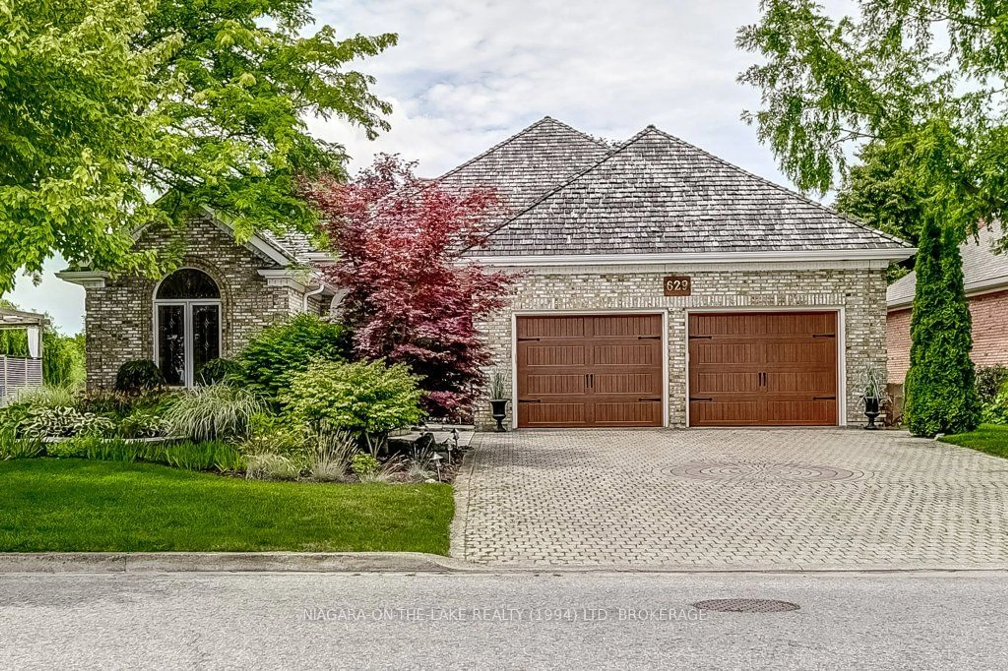 Home with brick exterior material, street for 629 Simcoe St, Niagara-on-the-Lake Ontario L0S 1J0