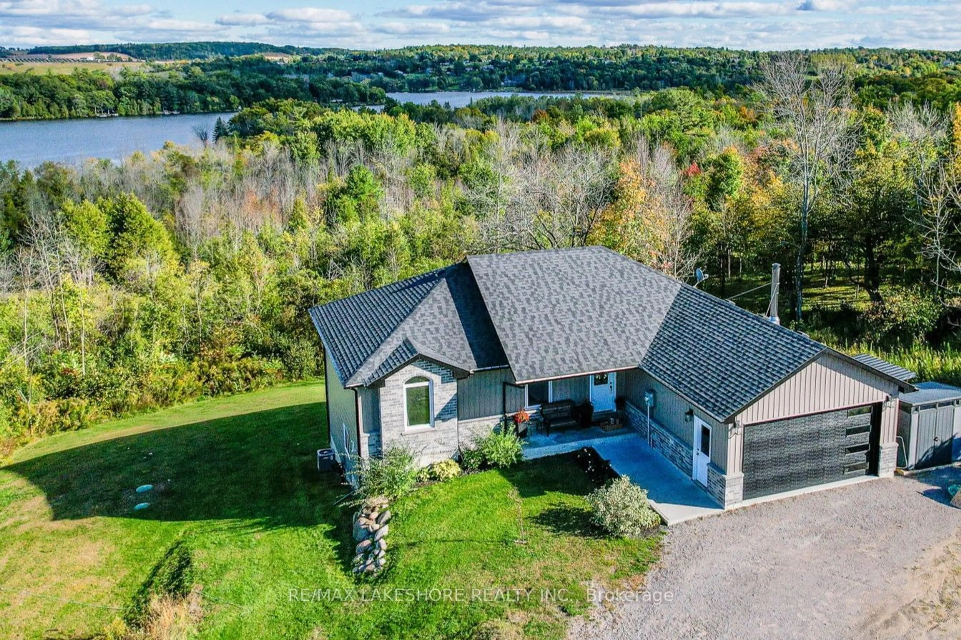 A pic from outside/outdoor area/front of a property/back of a property/a pic from drone, water/lake/river/ocean view for 103 Hampton Cres, Alnwick/Haldimand Ontario K0K 2X0