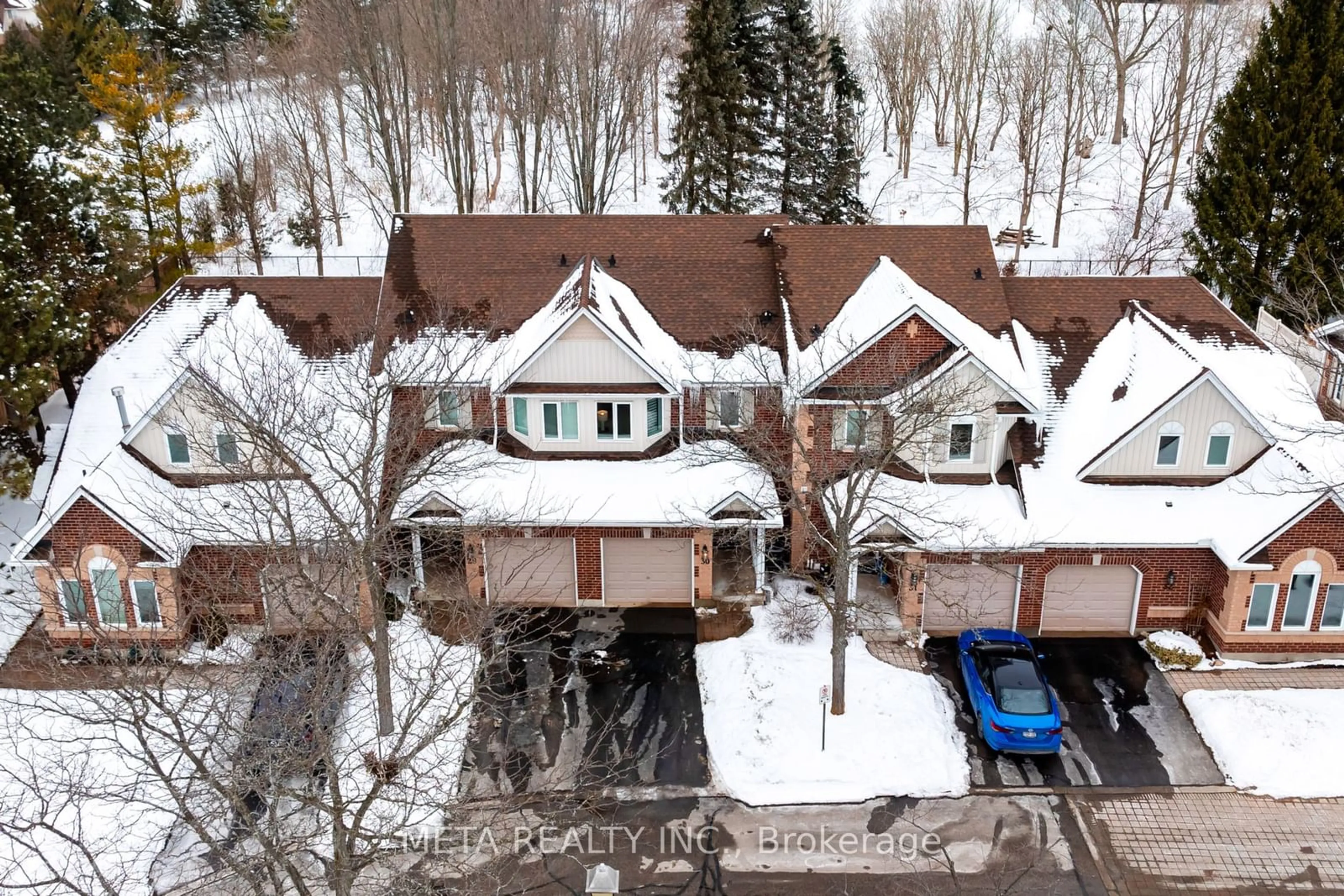 A pic from outside/outdoor area/front of a property/back of a property/a pic from drone, street for 39 Ptarmigan Dr #30, Guelph Ontario N1C 1E8