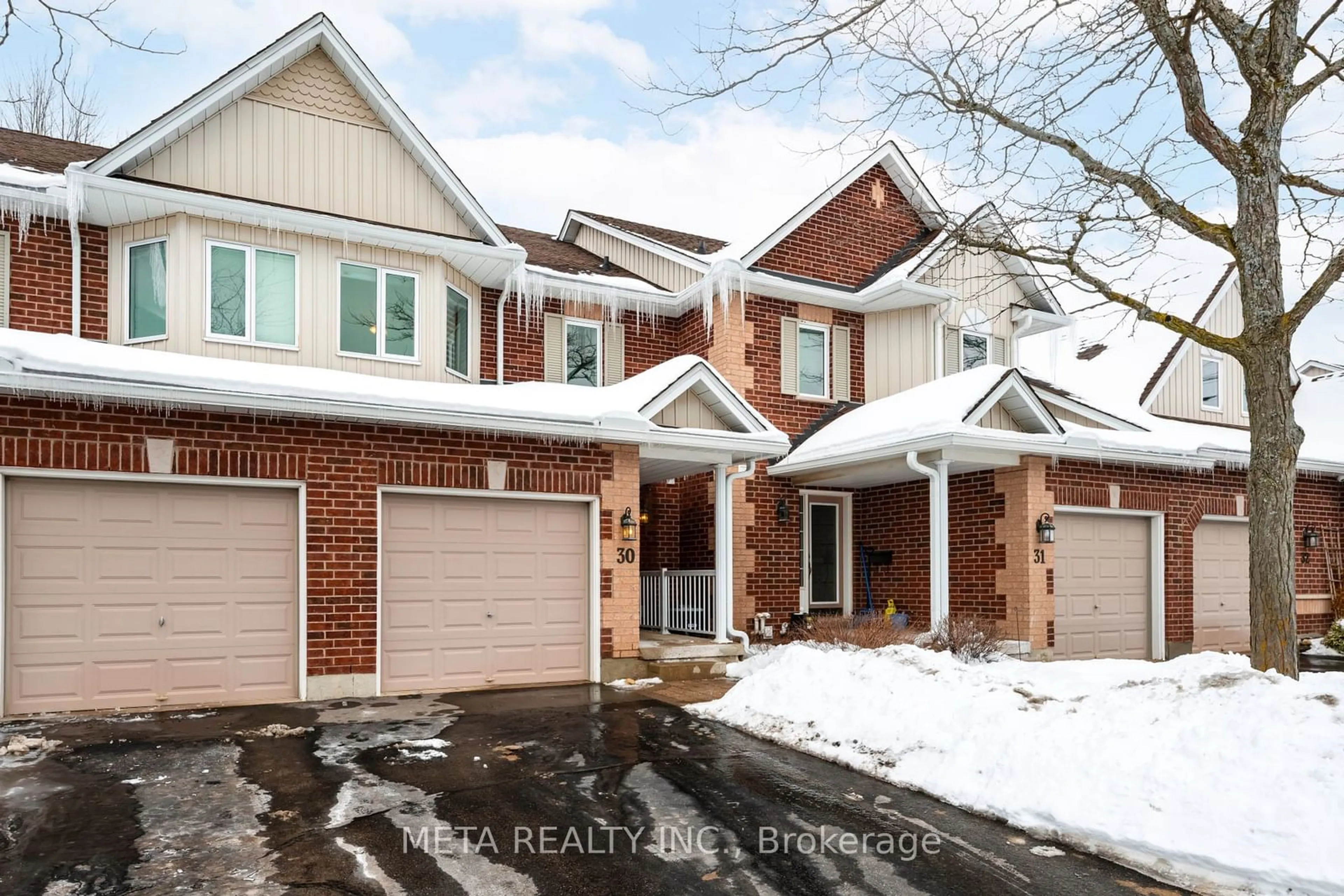 Home with brick exterior material, street for 39 Ptarmigan Dr #30, Guelph Ontario N1C 1E8