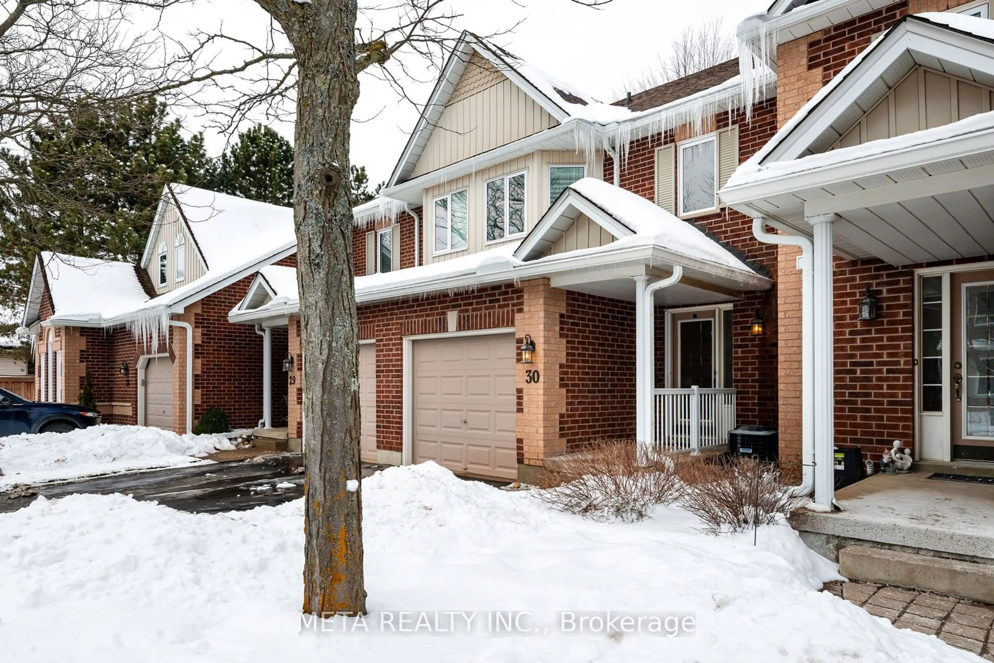 Home with brick exterior material, street for 39 Ptarmigan Dr #30, Guelph Ontario N1C 1E8