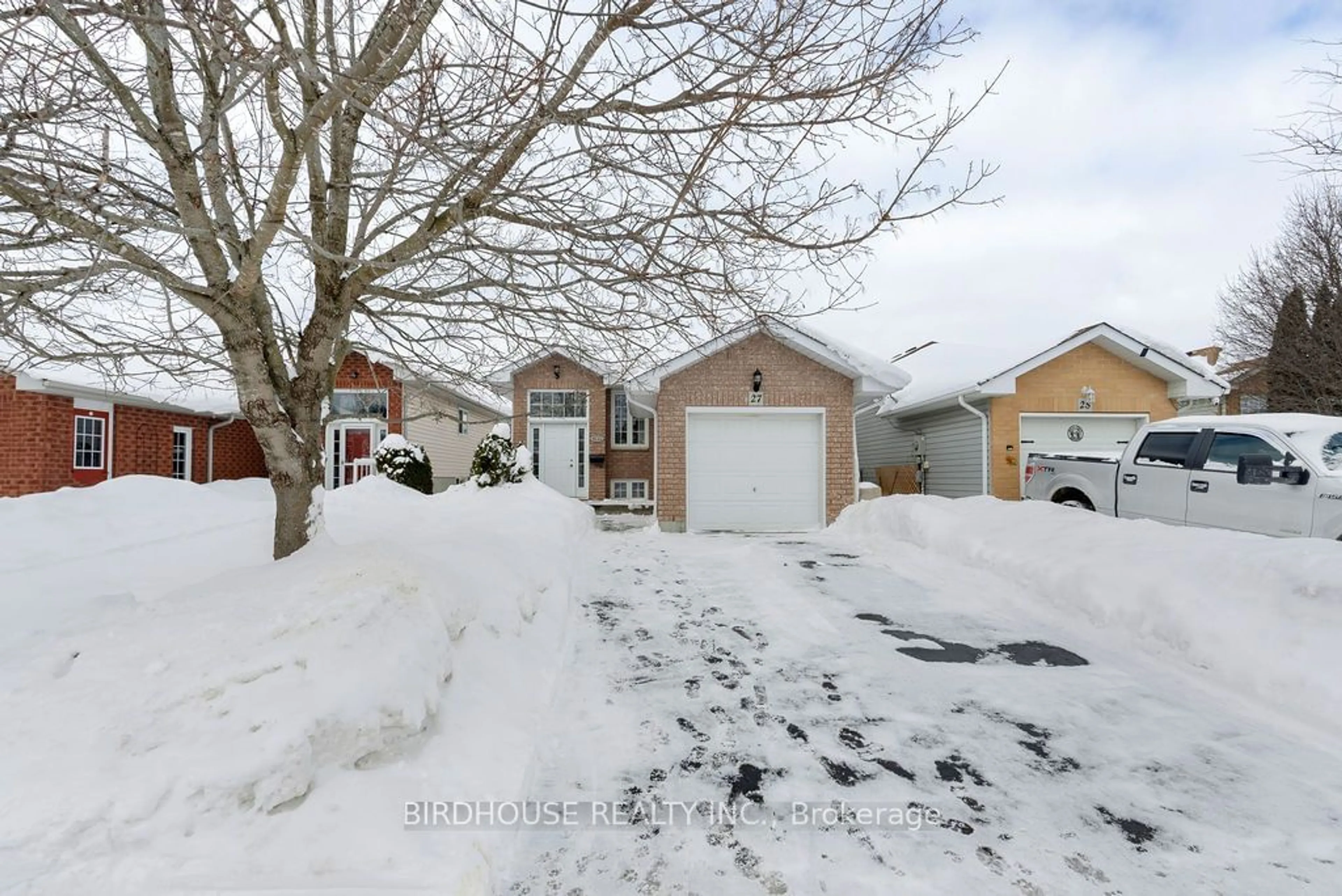 A pic from outside/outdoor area/front of a property/back of a property/a pic from drone, street for 27 Laurent Blvd, Kawartha Lakes Ontario K9V 6G3