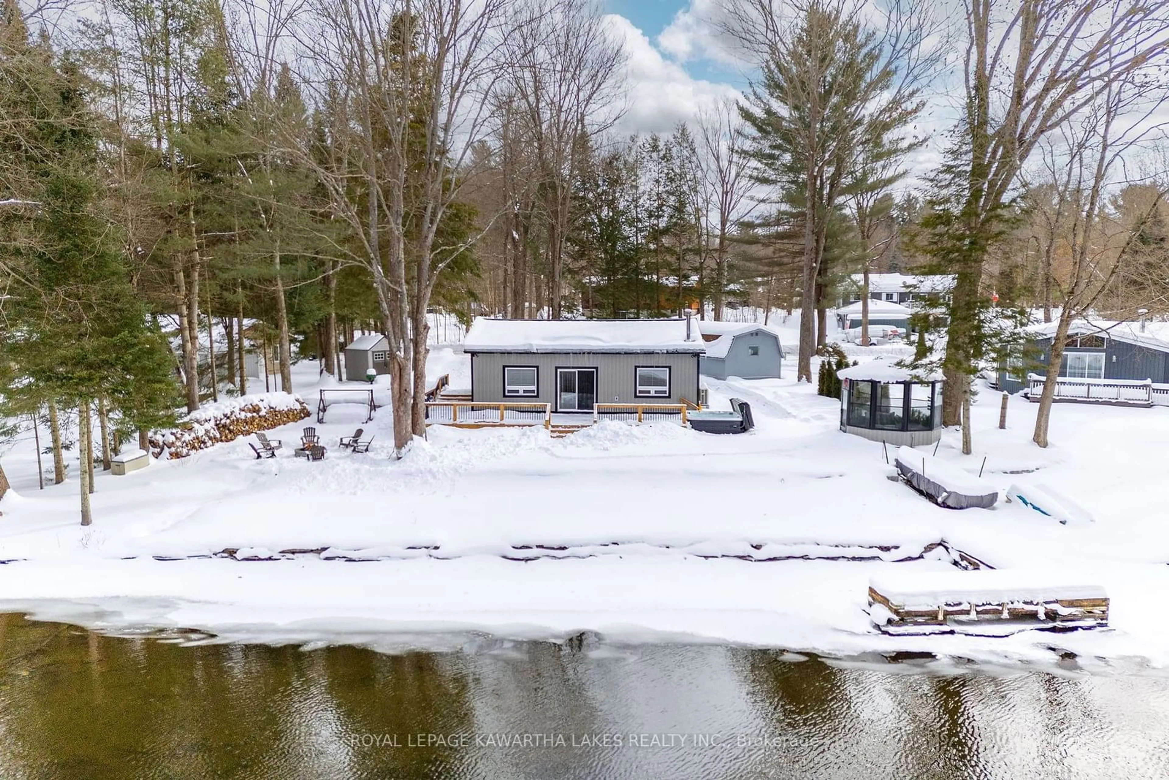 A pic from outside/outdoor area/front of a property/back of a property/a pic from drone, water/lake/river/ocean view for 11 Little Bay Dr, Kawartha Lakes Ontario K0M 2L0