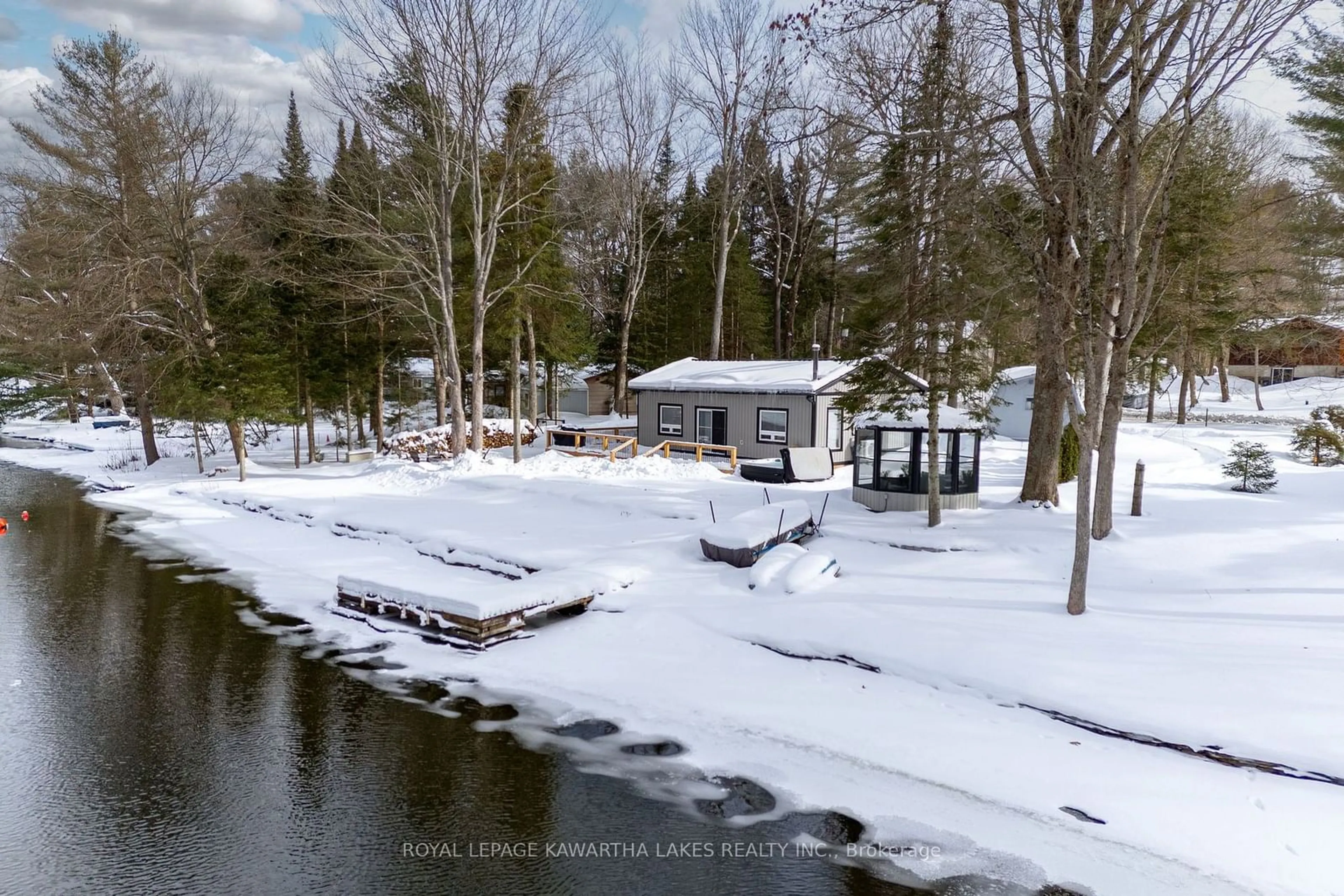 A pic from outside/outdoor area/front of a property/back of a property/a pic from drone, water/lake/river/ocean view for 11 Little Bay Dr, Kawartha Lakes Ontario K0M 2L0