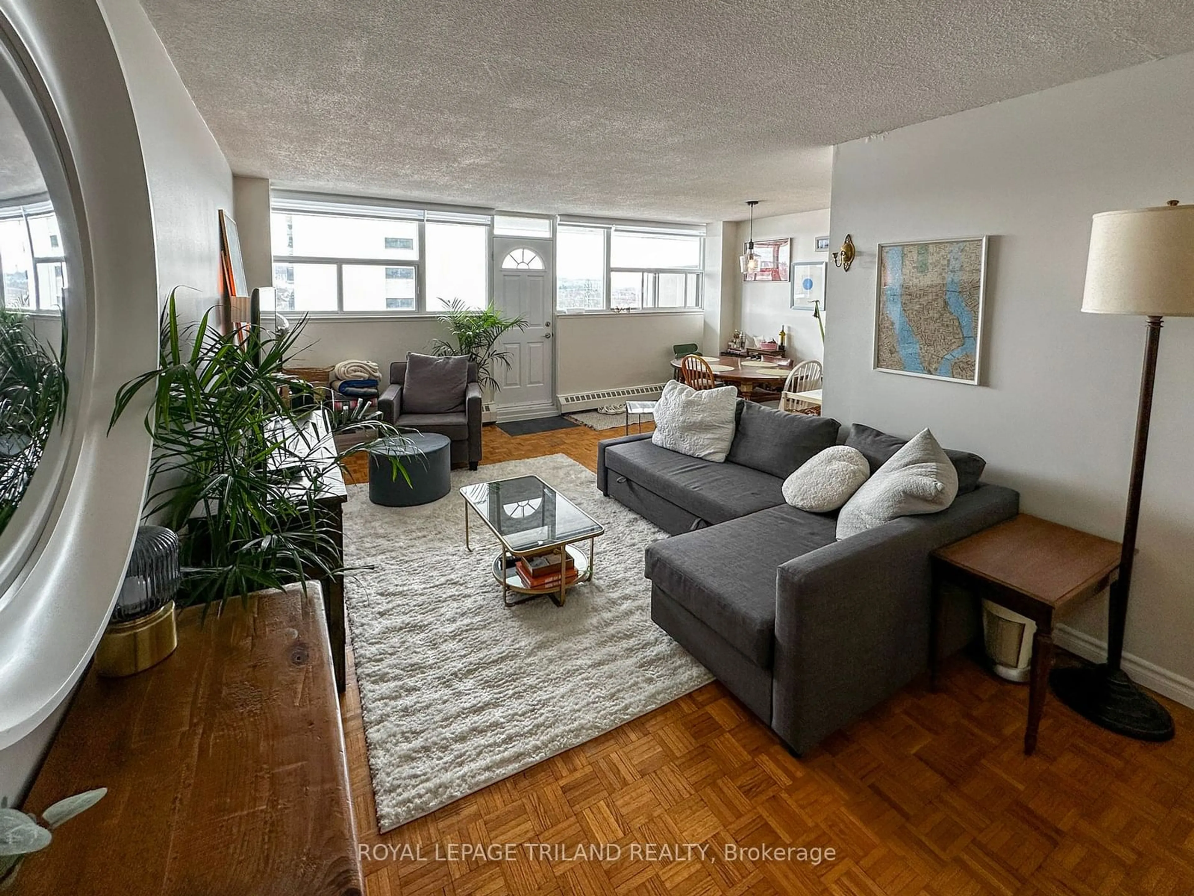 Living room with furniture, unknown for 215 Glenridge Ave #901, St. Catharines Ontario L2T 3J7