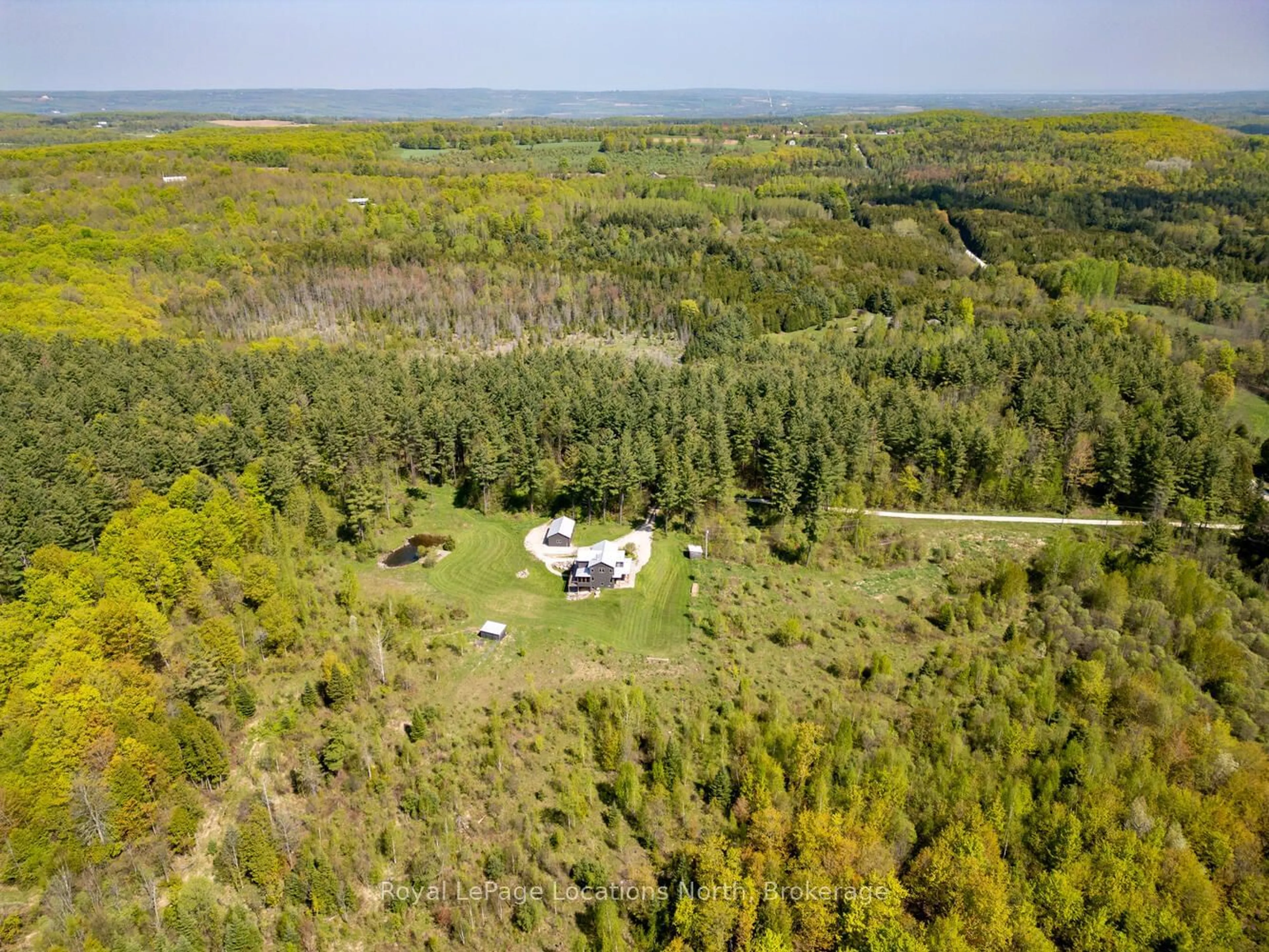 A pic from outside/outdoor area/front of a property/back of a property/a pic from drone, forest/trees view for 355310 BLUE MOUNTAINS EUPHRASIA TOWNLINE, Grey Highlands Ontario N0H 1J0