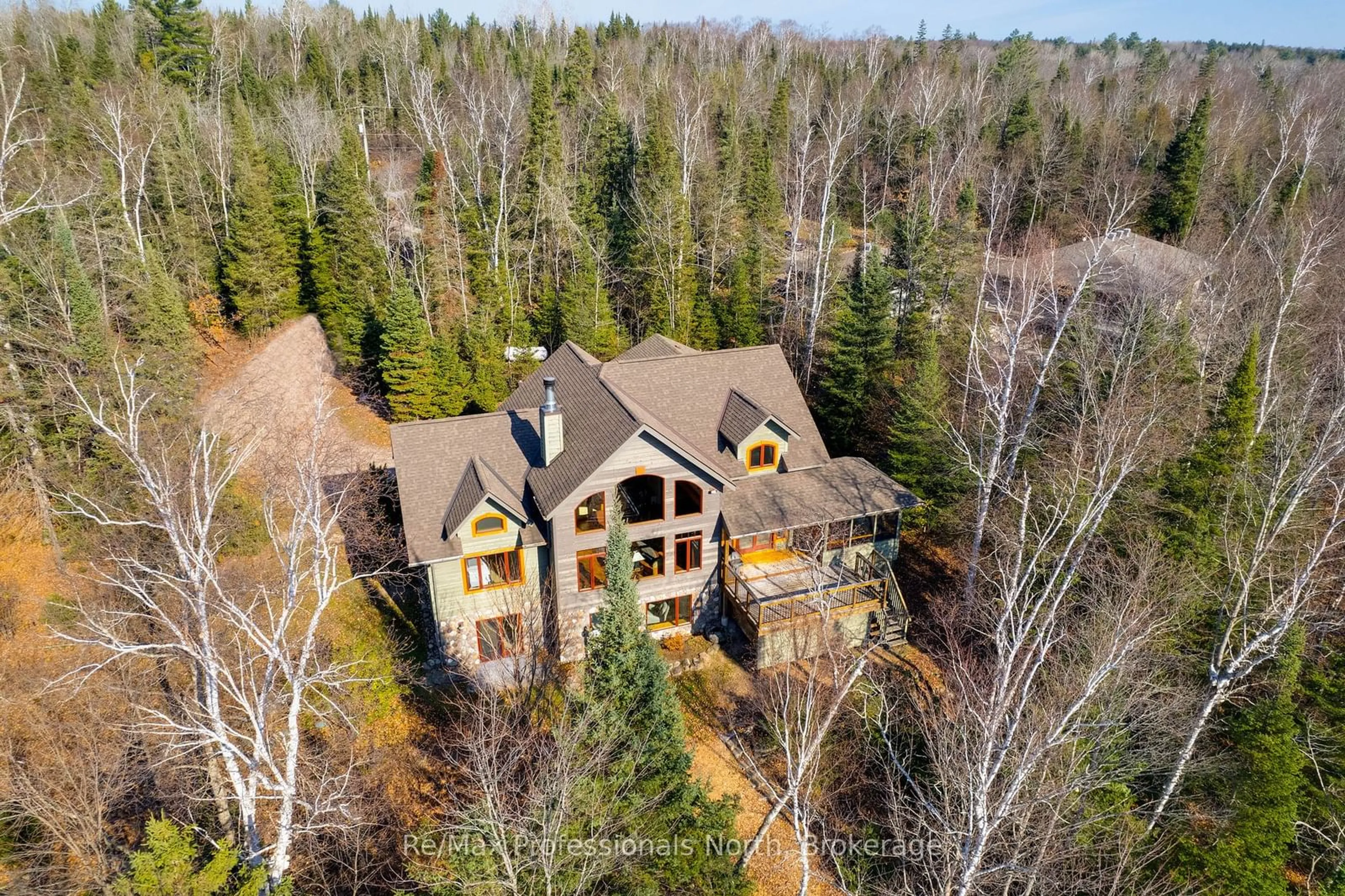 A pic from outside/outdoor area/front of a property/back of a property/a pic from drone, forest/trees view for 2625 Northshore Rd, North Bay Ontario P1B 8G4