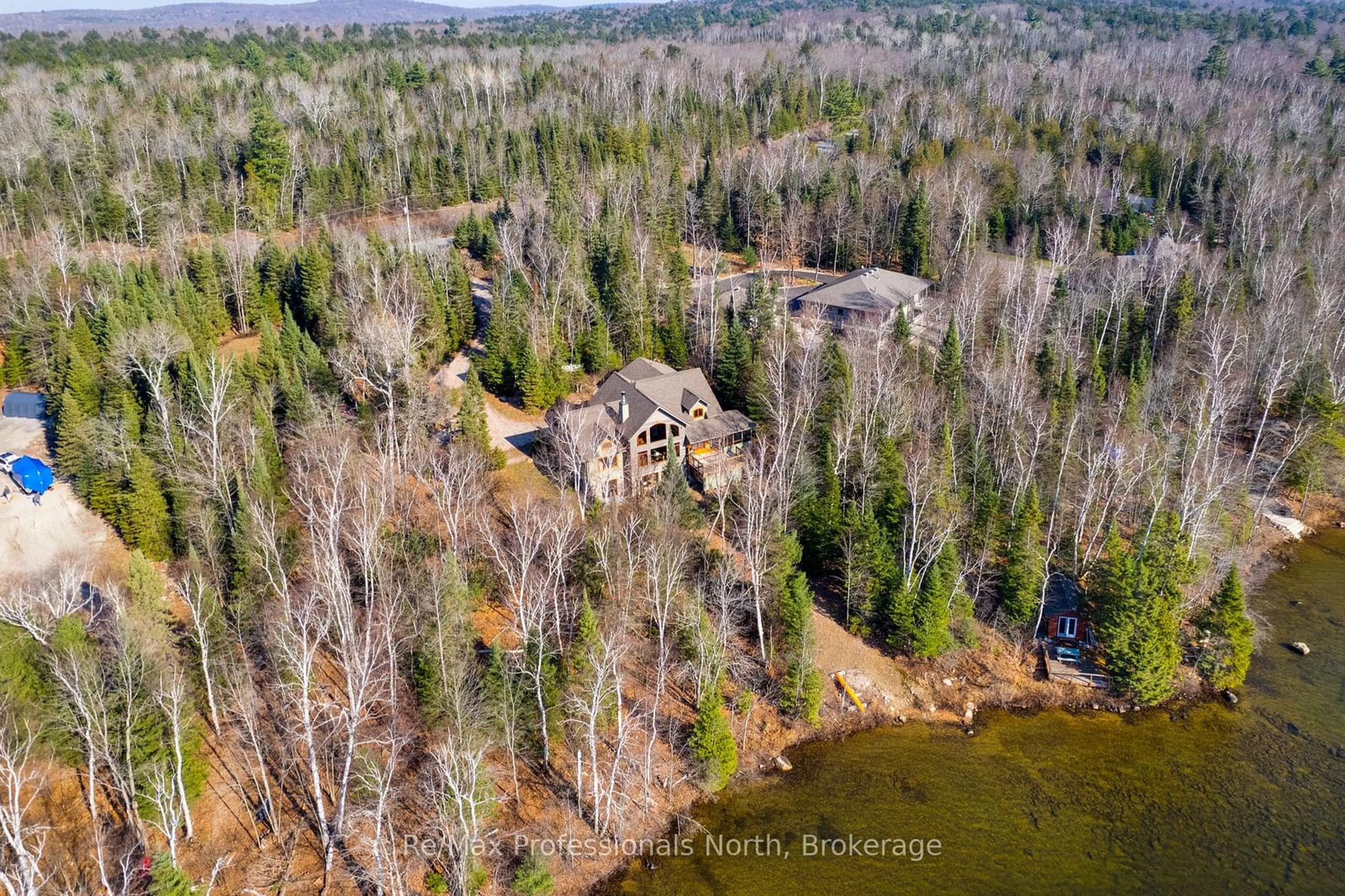 A pic from outside/outdoor area/front of a property/back of a property/a pic from drone, forest/trees view for 2625 Northshore Rd, North Bay Ontario P1B 8G4