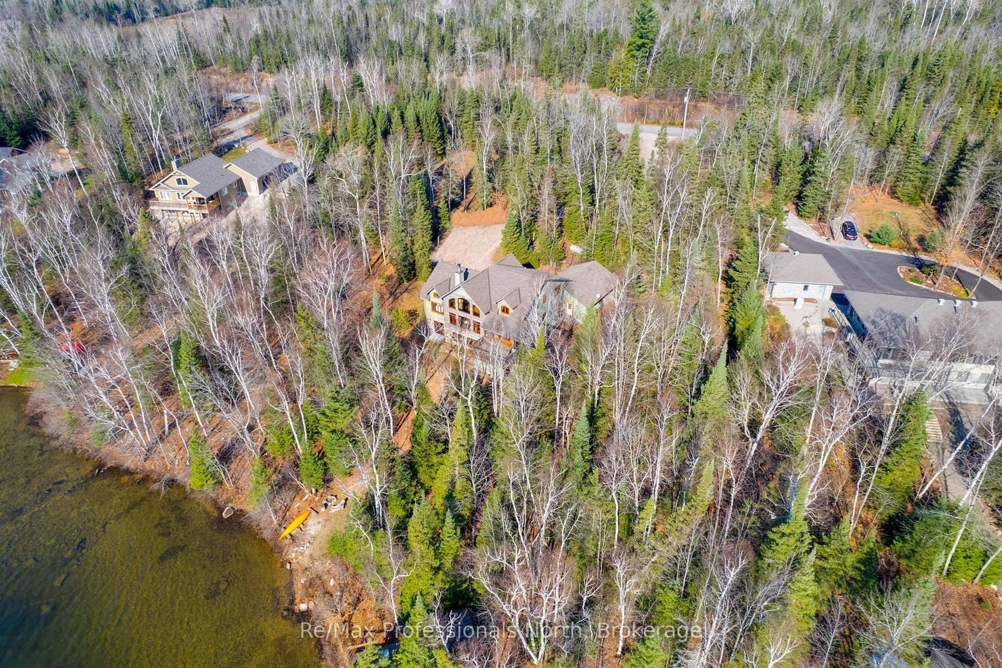 A pic from outside/outdoor area/front of a property/back of a property/a pic from drone, forest/trees view for 2625 Northshore Rd, North Bay Ontario P1B 8G4