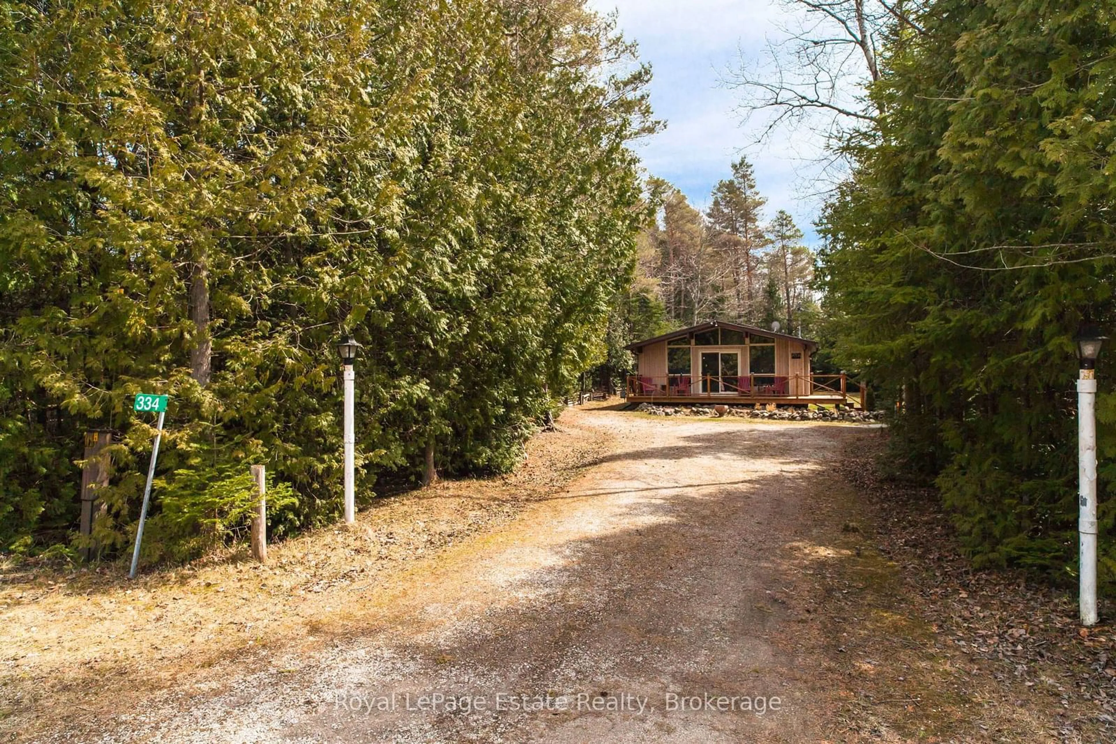 A pic from outside/outdoor area/front of a property/back of a property/a pic from drone, forest/trees view for 334 Sixth St, South Bruce Peninsula Ontario N0H 2G0