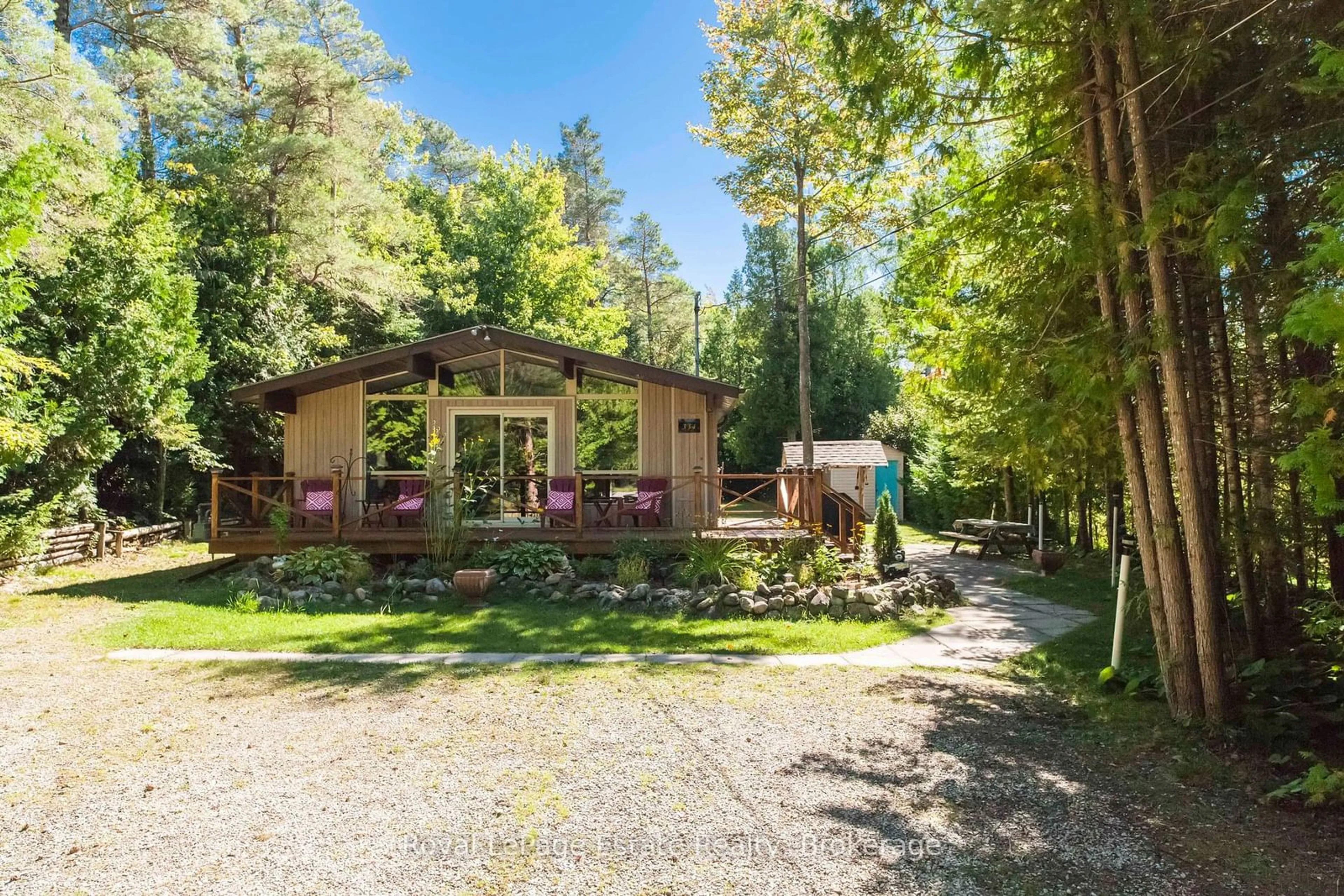 A pic from outside/outdoor area/front of a property/back of a property/a pic from drone, forest/trees view for 334 Sixth St, South Bruce Peninsula Ontario N0H 2G0