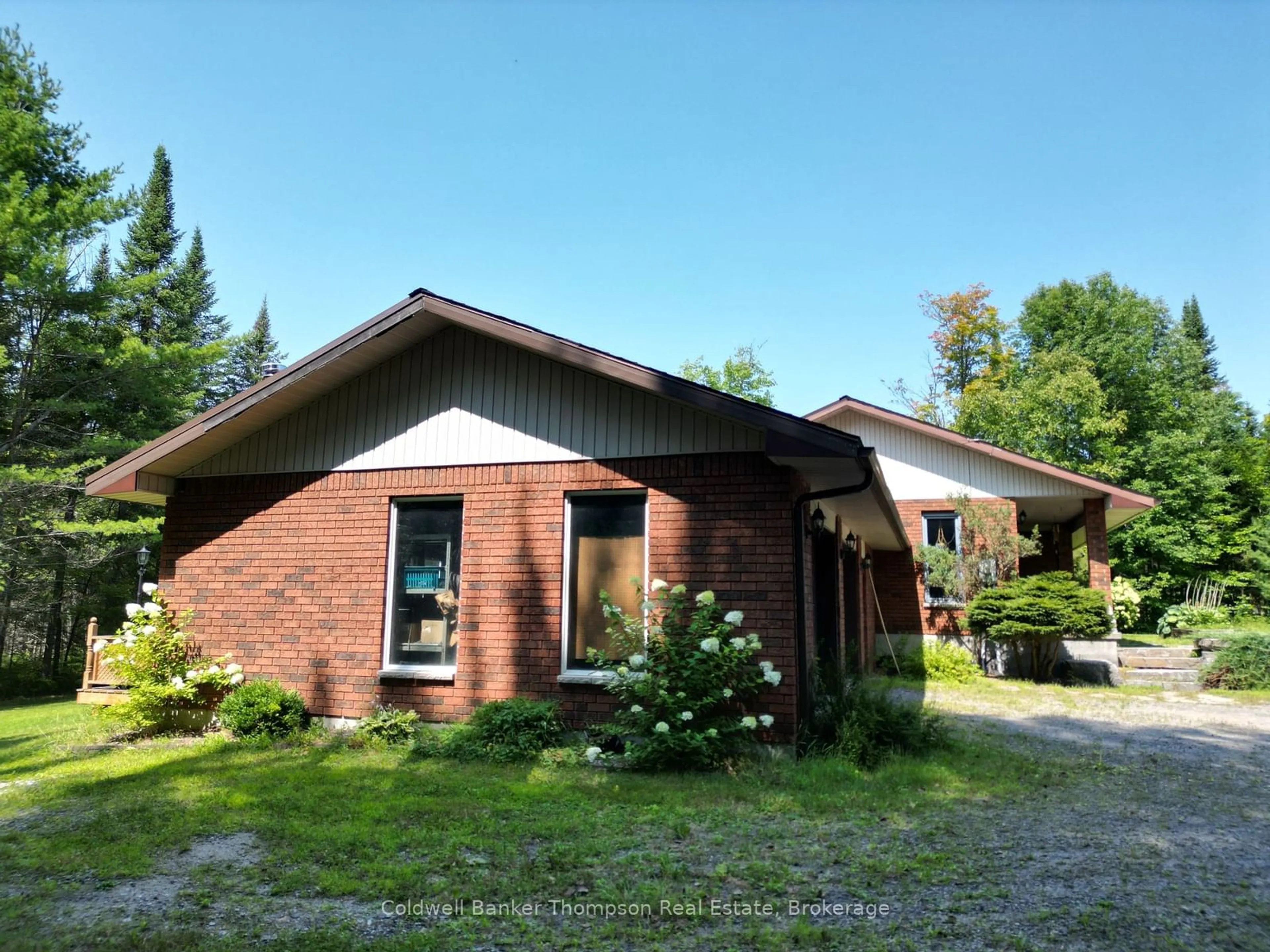 Home with brick exterior material, building for 2551 Brunel Rd, Huntsville Ontario P1H 2J3