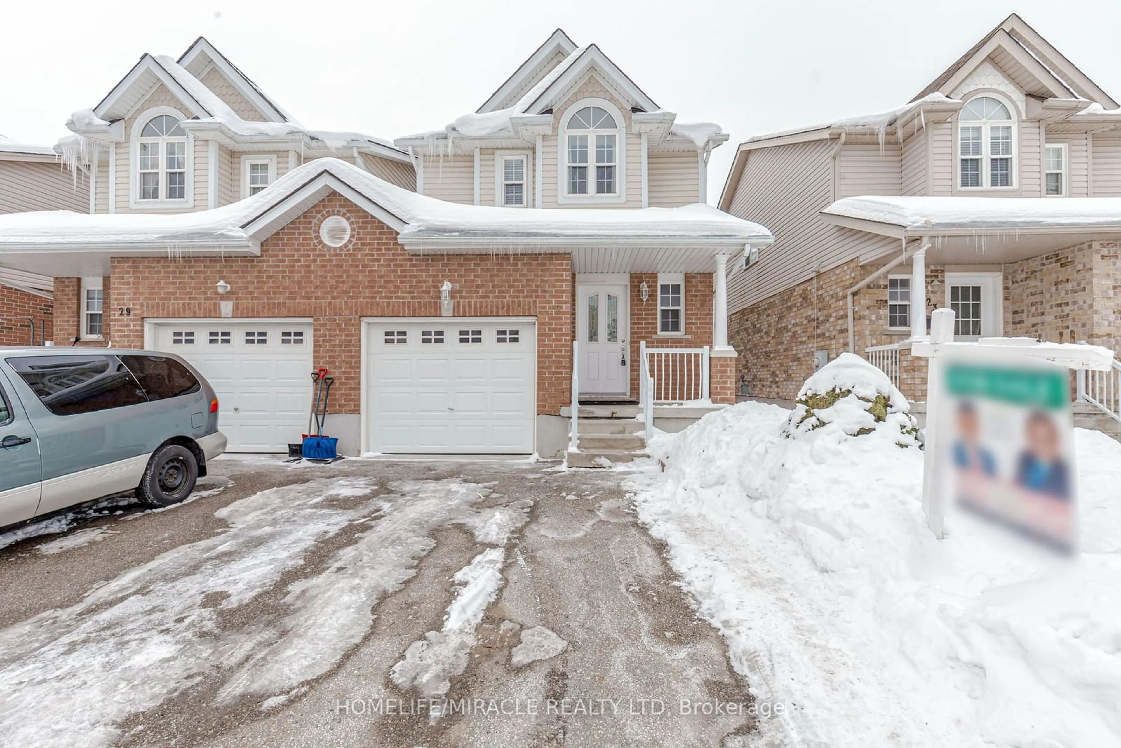 Home with brick exterior material, street for 25 Donnenwerth Dr, Kitchener Ontario N2E 3X2