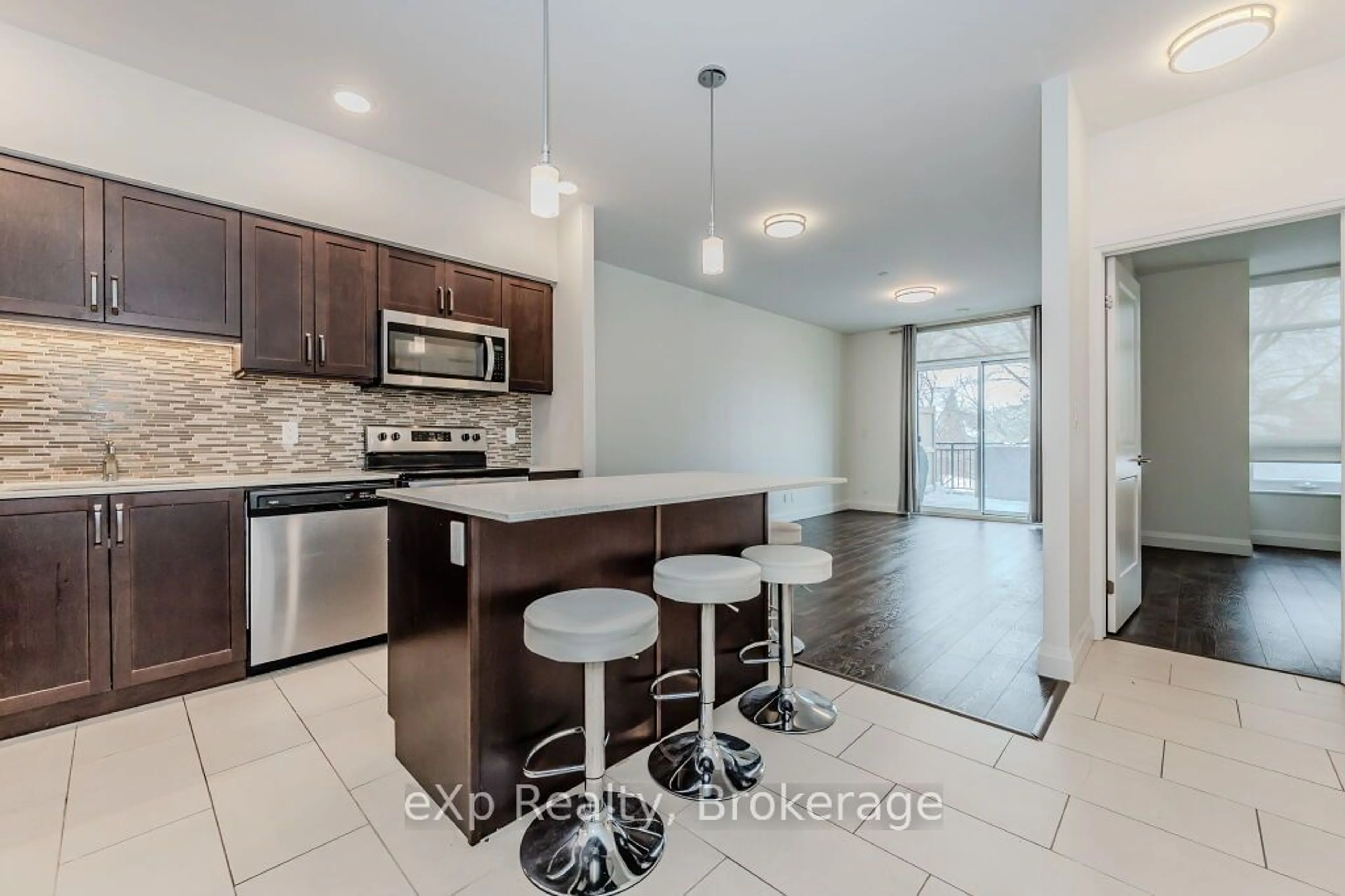 Open concept kitchen, ceramic/tile floor for 399 Queen St #107, Kitchener Ontario N2G 0C4